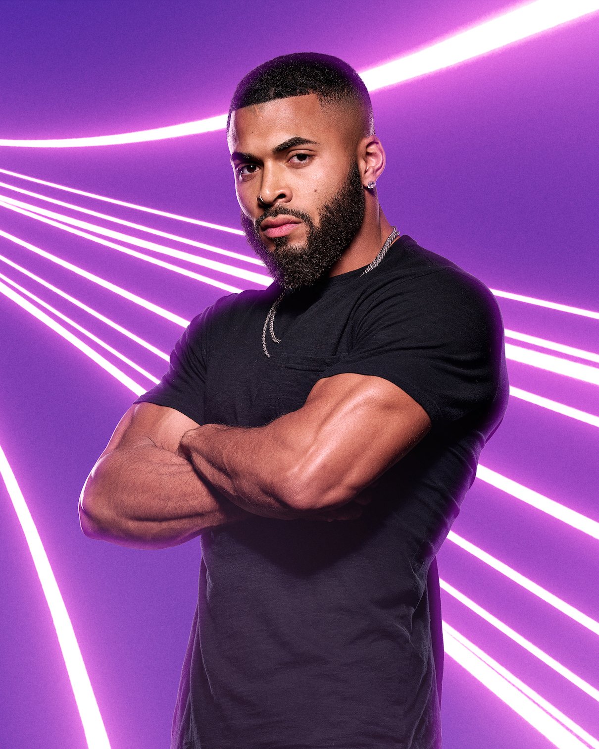 Johnny Middlebrooks from 'The Challenge' Season 38 cast against a purple background