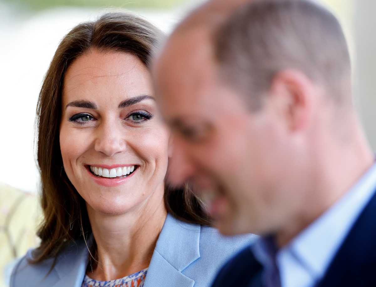 Kate Middleton, who silently 'teases' Prince William with her smile according to a body language expert, smiles at Prince William