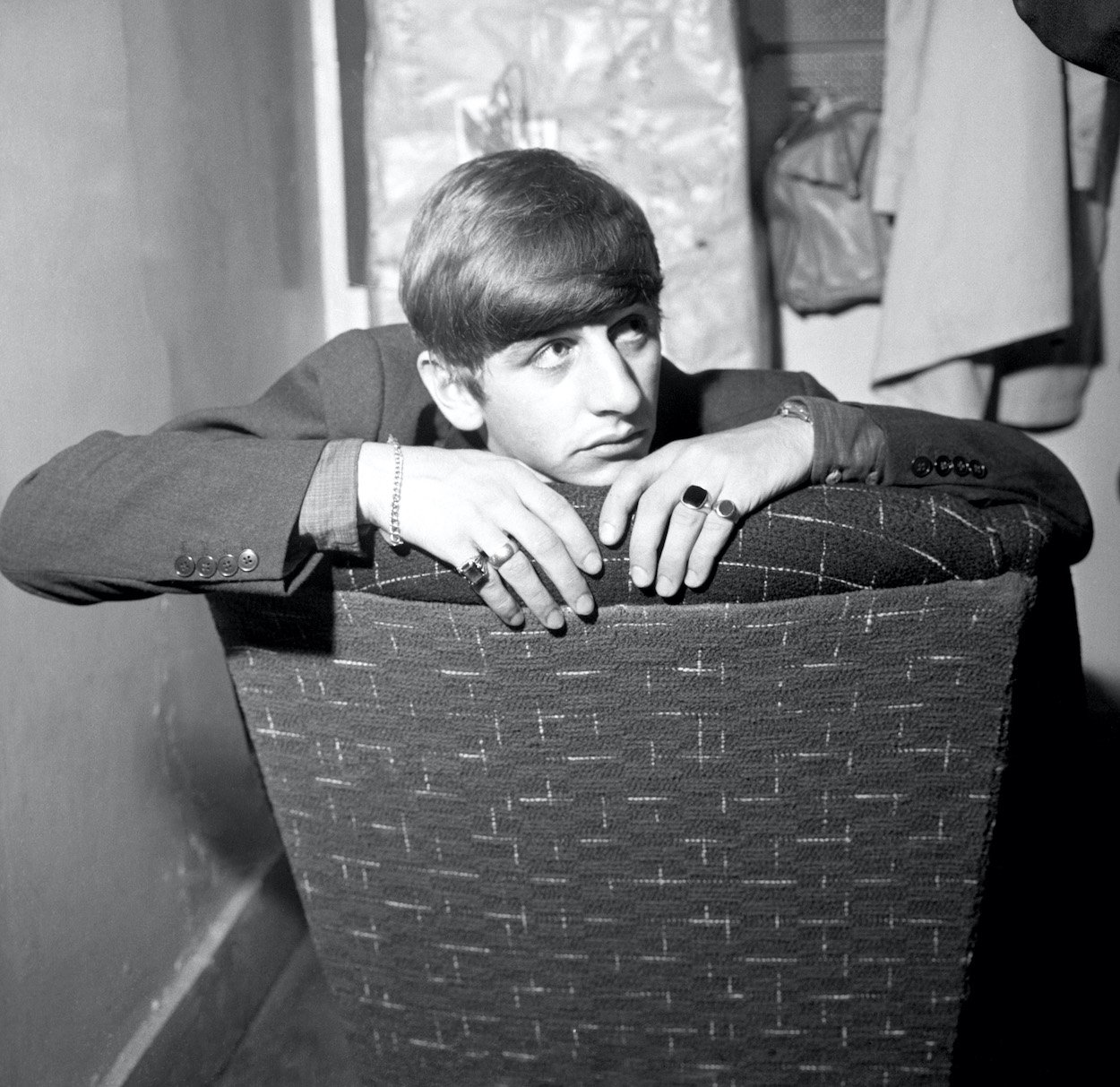 Ringo Starr prepares for a 1963 television appearance just a few years after he had to beg other drummers to share equipment when he began his career.