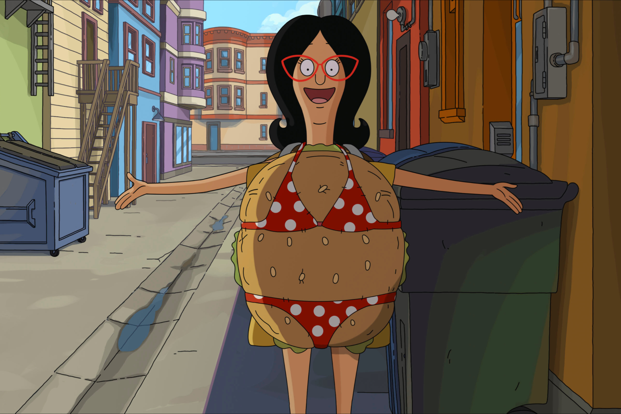 'The Bob's Burgers Movie' Linda Belcher (voiced by John Roberts) wearing a burger mascot costume with a bikini on over it. She's holding her arms outward. She's standing in an alleyway.