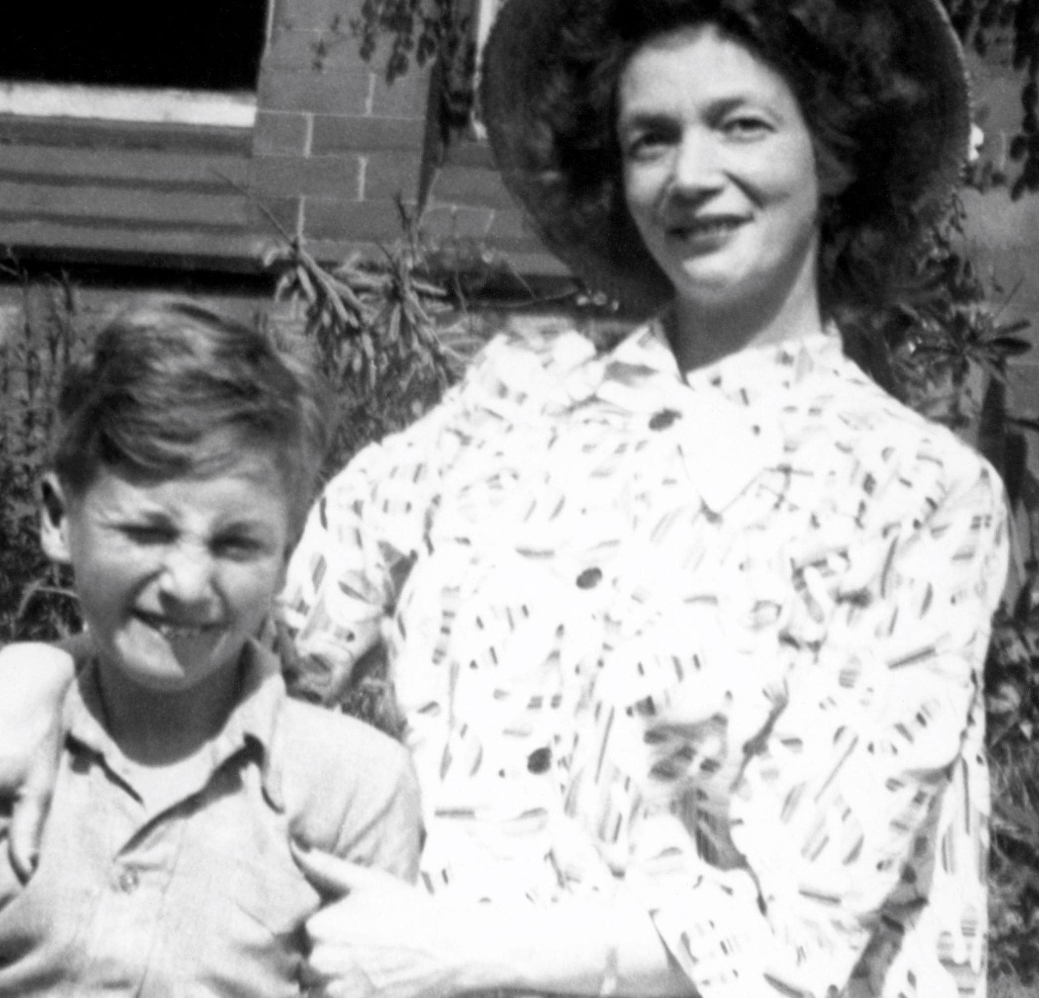 John Lennon and his mother, Julia Lennon, in black-and-white