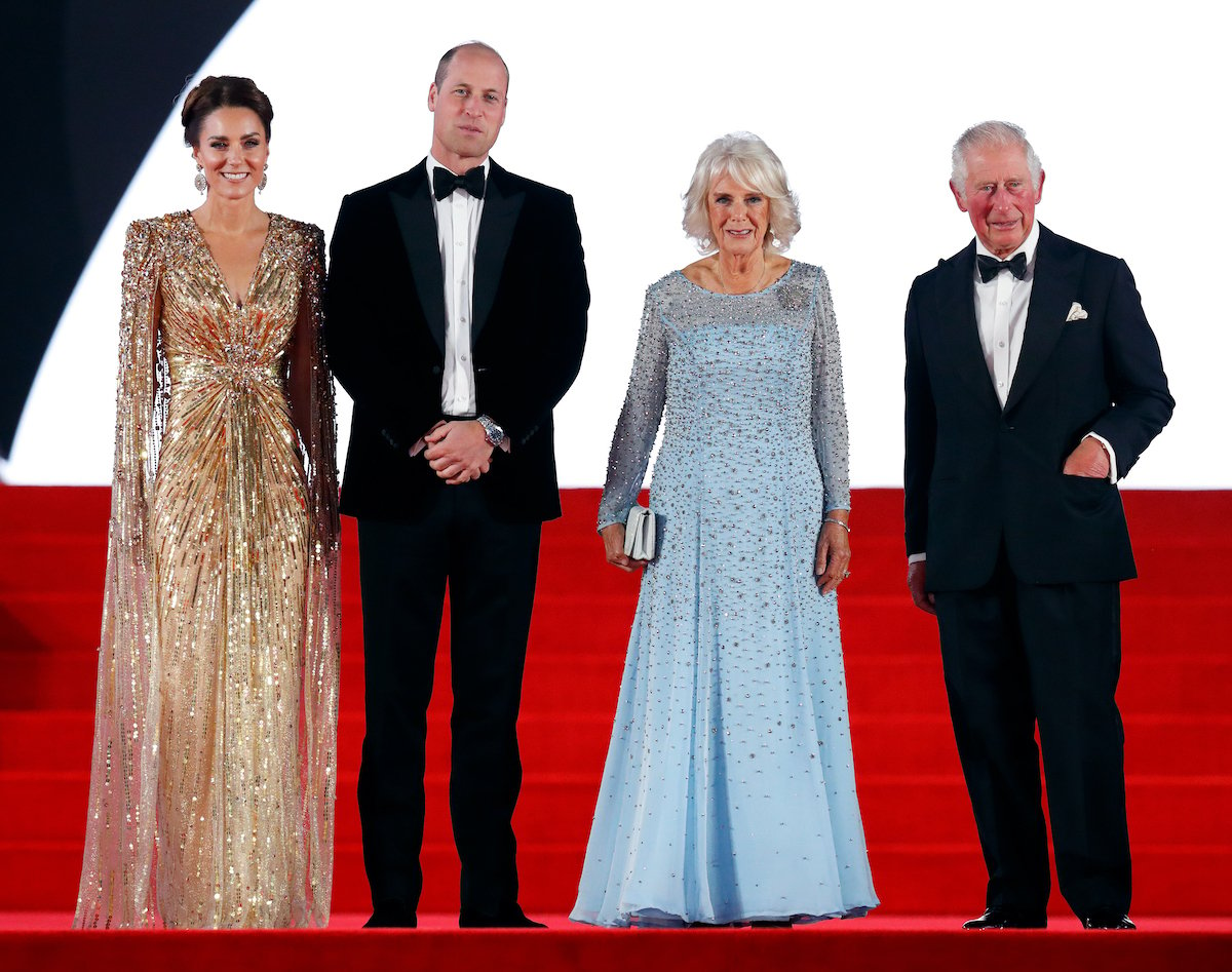 Kate Middleton, Prince William, Camilla Parker Bowles, and King Charles at a movie premiere