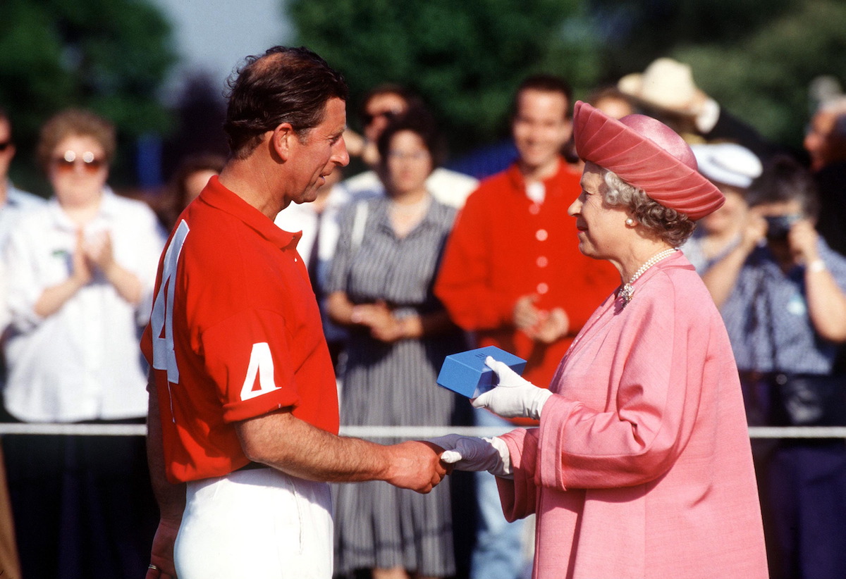 King Charles and Queen Elizabeth, who reacted to the 1994 documentary 'Charles: The Private Man, the Public Role' with five words — 'So, it's come to this' — according to a book, shake hands at a polo match in June 1994