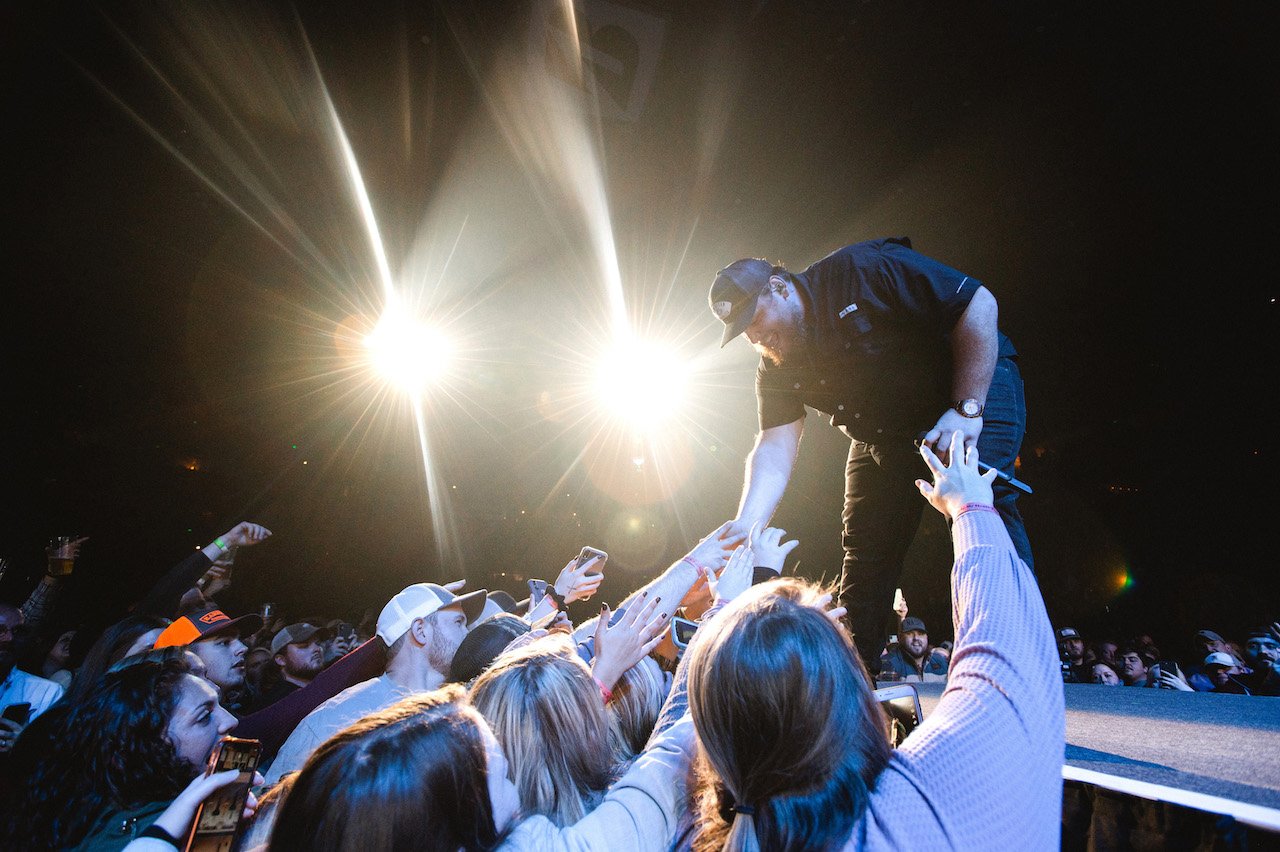 Luke Combs, shown performing at Bridgestone Arena on December 13, 2019, announced a gender reveal for lucky fans.