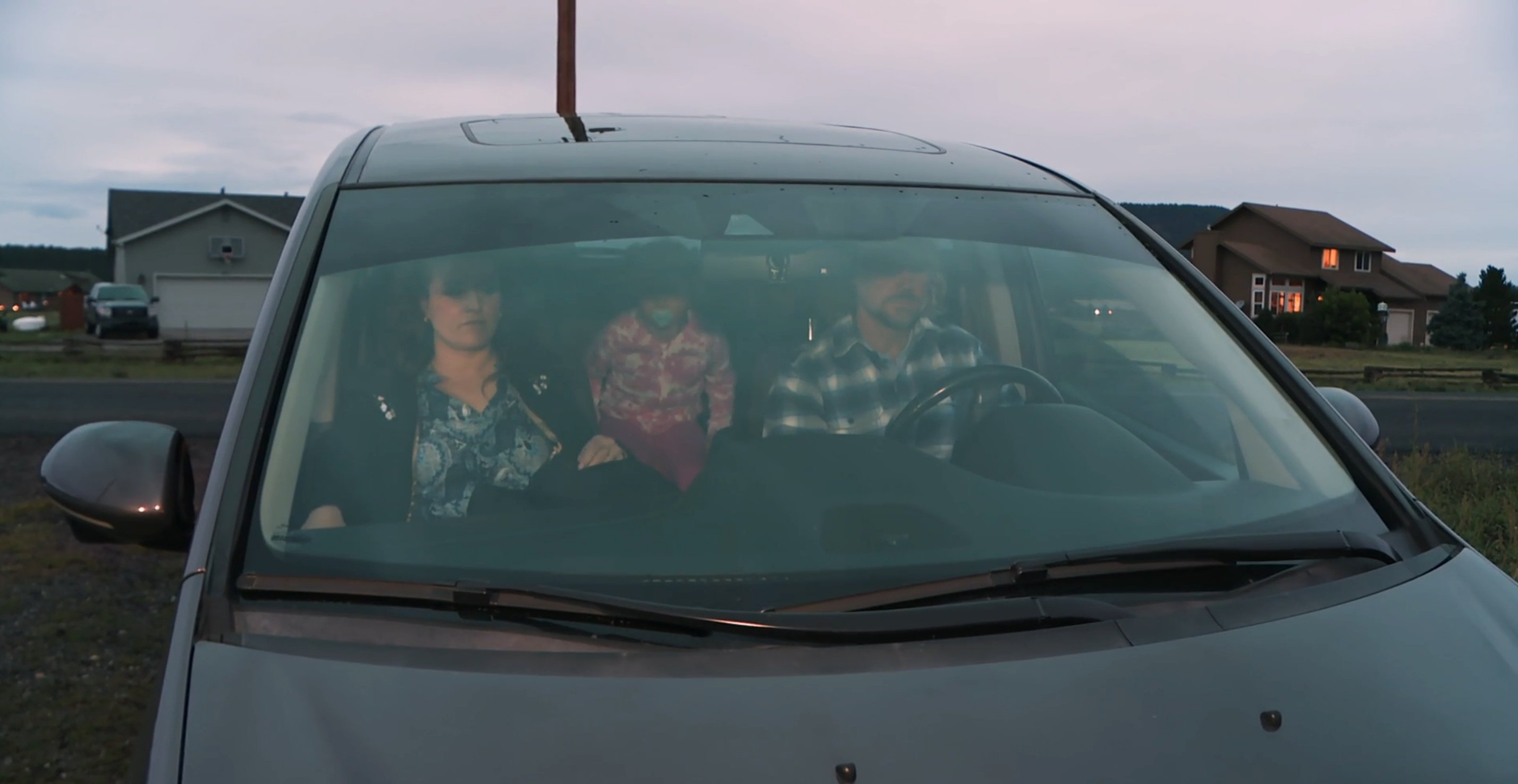 Robyn Brown, Ariella Brown, and Kody Brown in a minivan driving up to Christine Brown's house in 'Sister Wives' Season 17 on TLC.