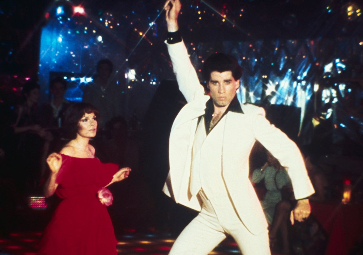 'Saturday Night Fever': John Travolta strikes his signature pose on the dance floor with Karen Gorney
