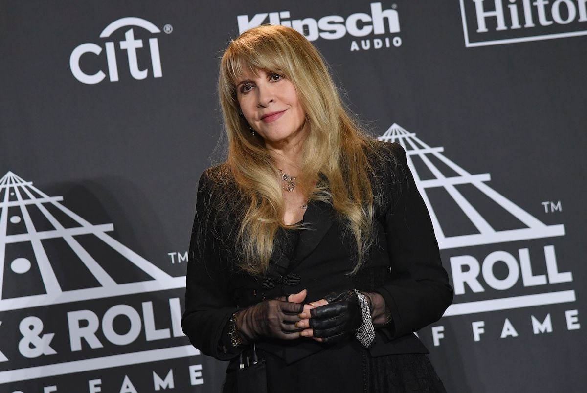 Stevie Nicks, who shared a Halloween throwback photo of herself dressed in a witch costume.