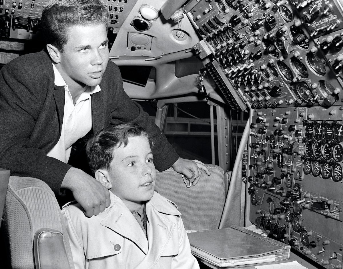 Tony Dow and Jerry Mathers of 'Leave It to Beaver' in the cockpit of a plane