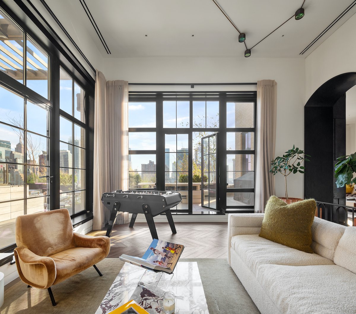 A room in Trevor Noah's NYC apartment with view of terrace