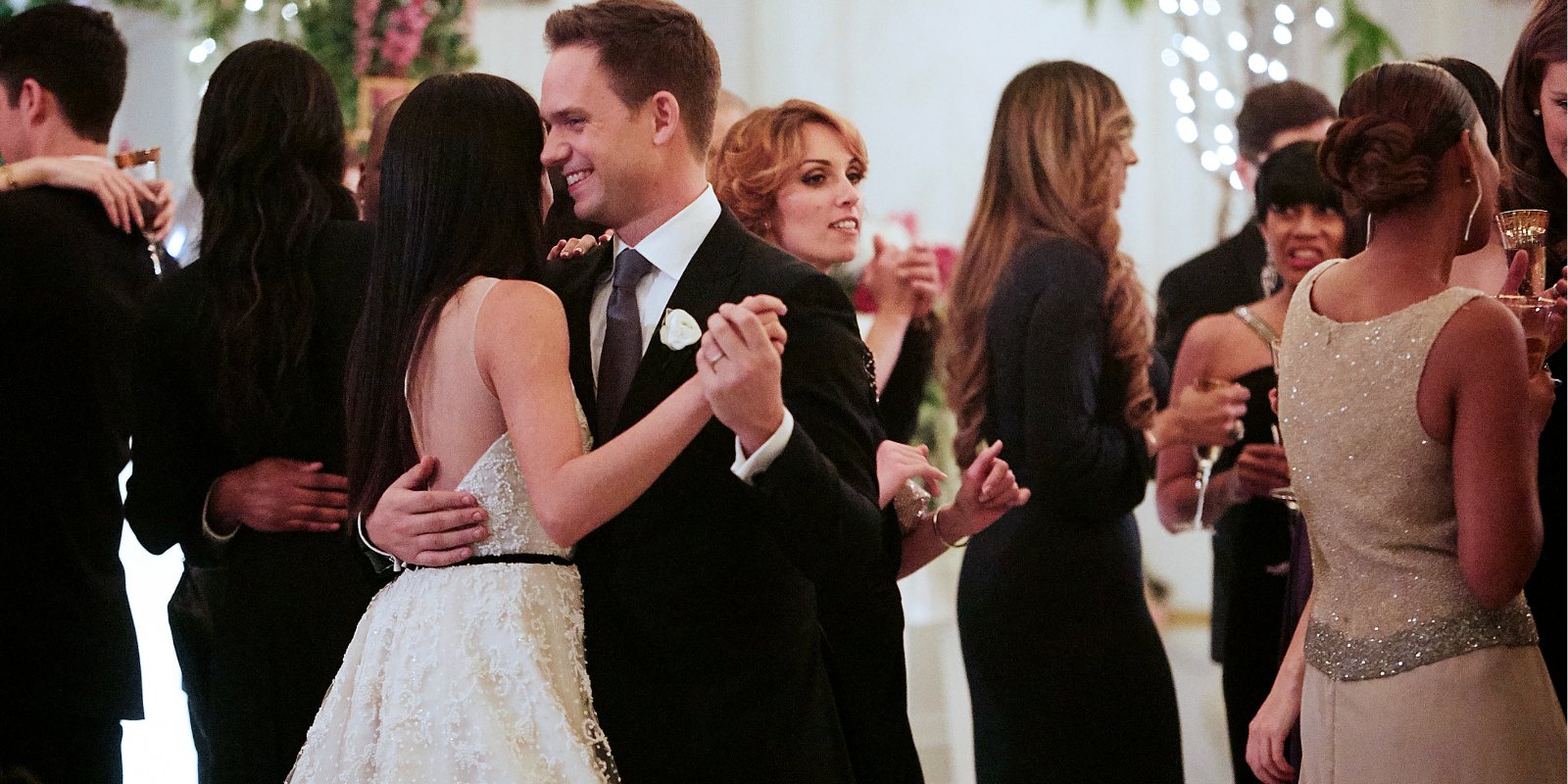 Meghan Markle and Patrick Adams photographed during their characters wedding on 'Suits.'