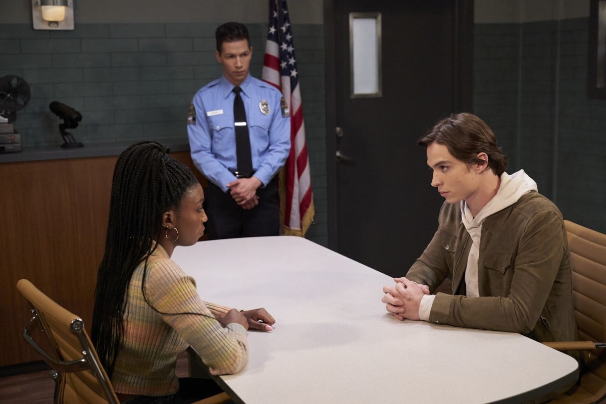 'General Hospital' stars Tabyana Ali, Michael Blake Kruse, and Nicholas Alexander Chavez in a police station set from the soap opera.