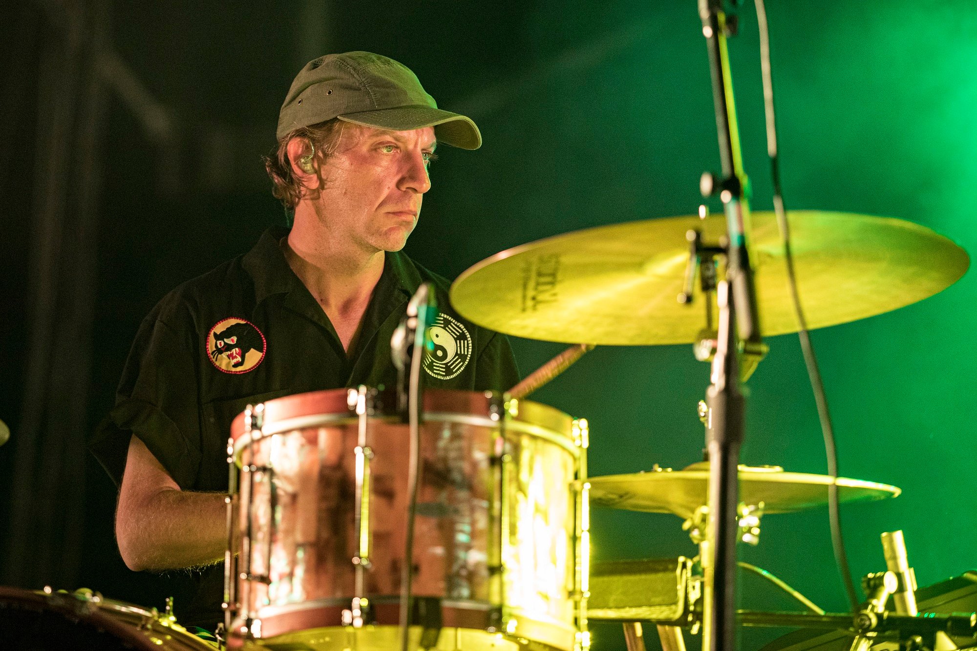 Jeremiah Green of the band Modest Mouse sits behind a drum set