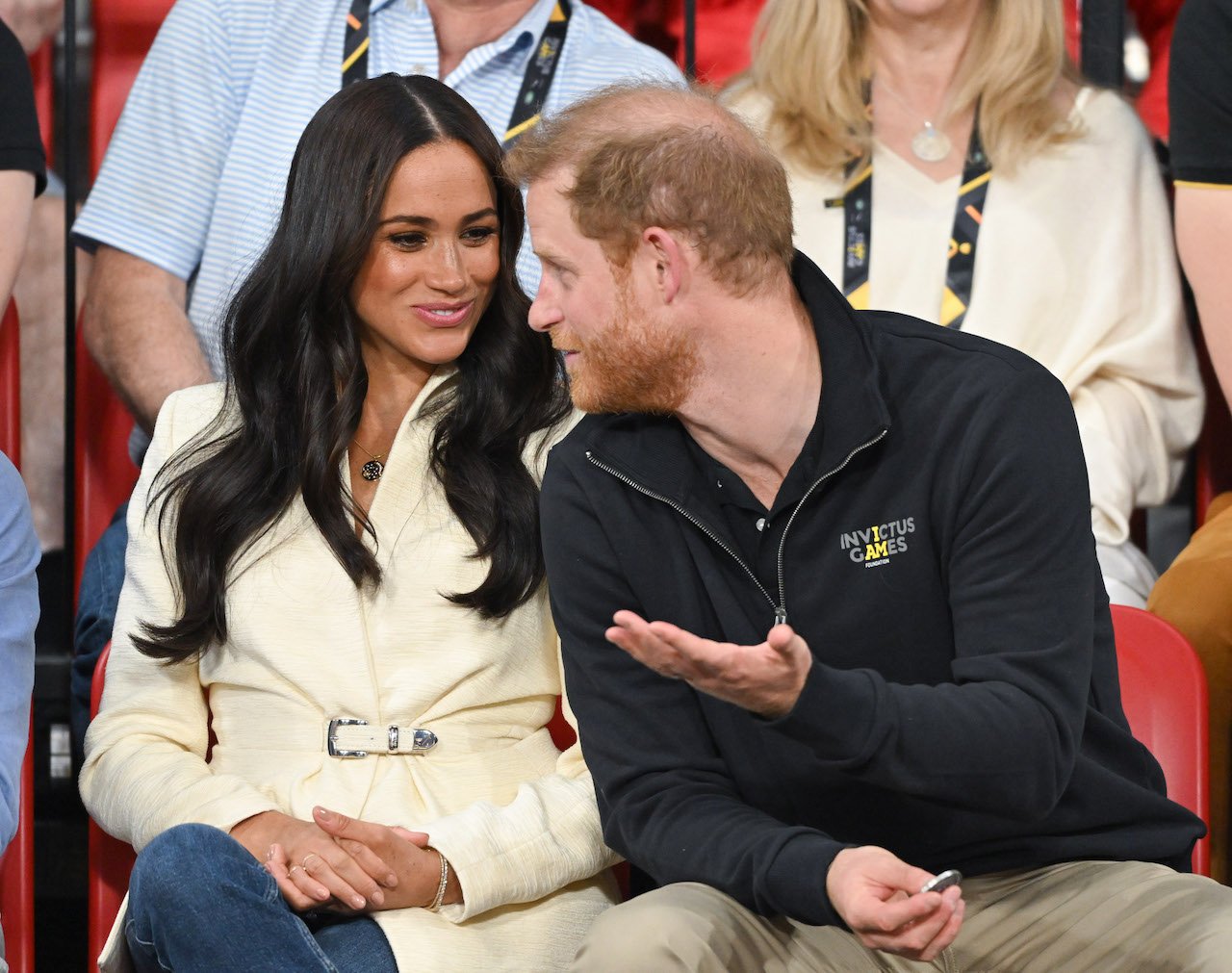 Prince Harry and Meghan Markle, Duke and Duchess of Sussex, attend the sitting volleyball event during the Invictus Games at Zuiderpark on April 17, 2022. One body language expert thinks Meghan showed her 'soft side' in the Netflix docuseries, 'Harry & Meghan.'