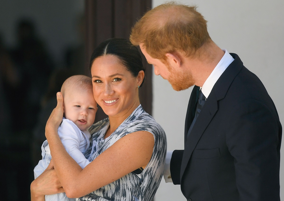 Prince Harry and Meghan Markle, who are accused of using misleading footage and photos in their docuseries, with their son Archie Mountbatten-Windsor meeting Archbishop Desmond Tutu in 2019