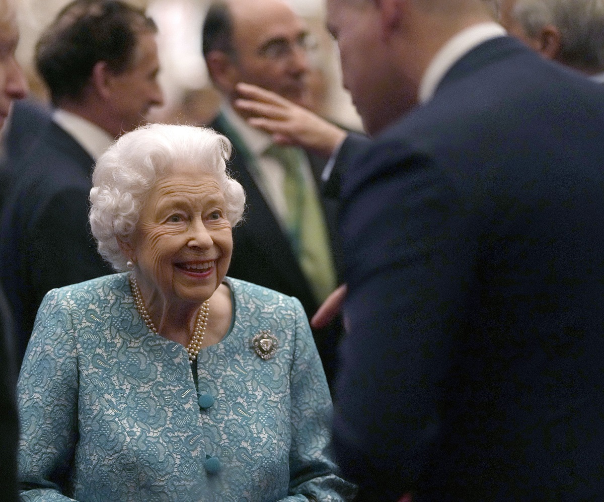 Queen Elizabeth II greeting guests during a reception for international business and investment leaders at Windsor Castle