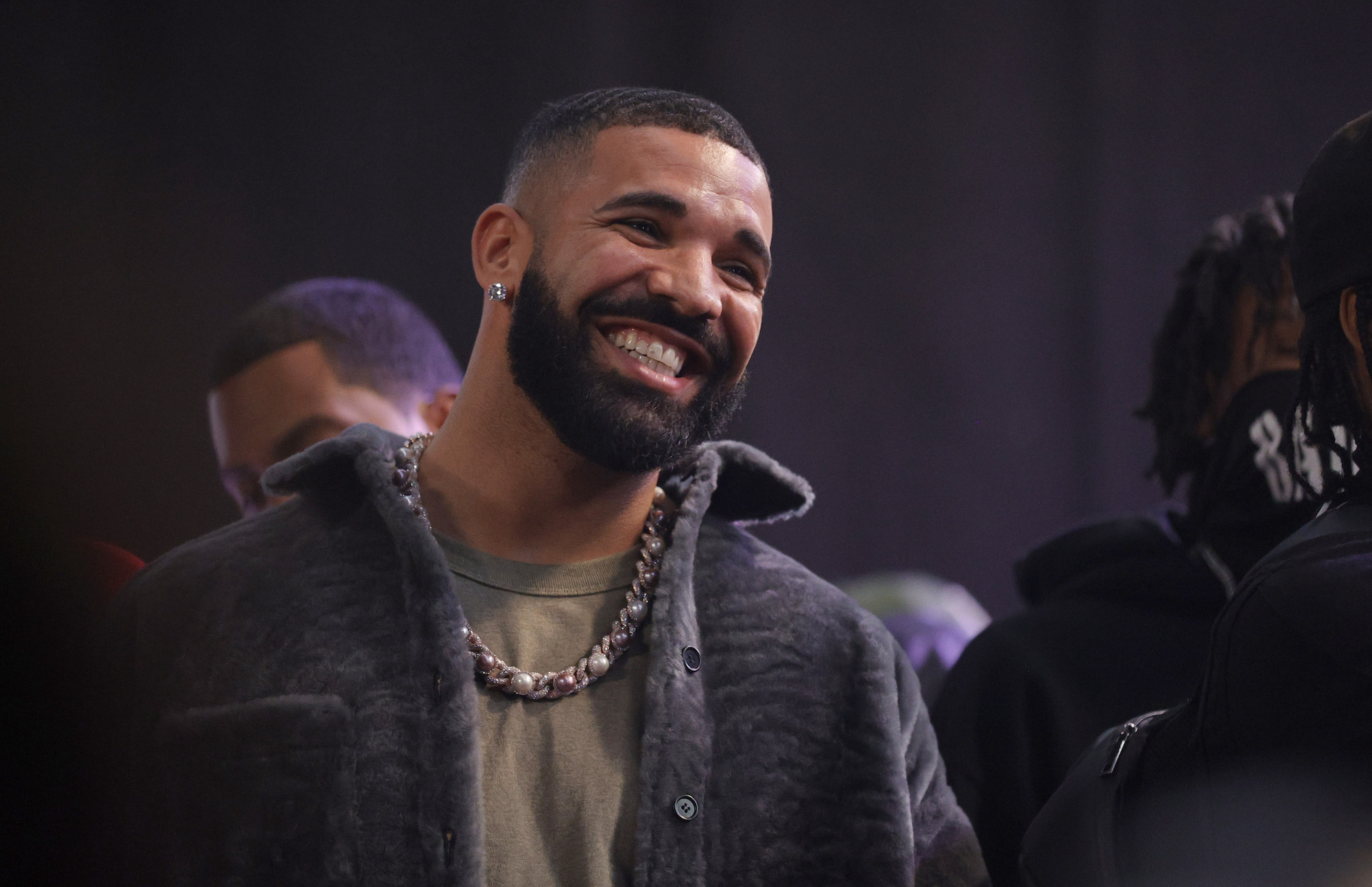 Drake, whose many exes were the subject of a new SNL sketch, smiling for a photo