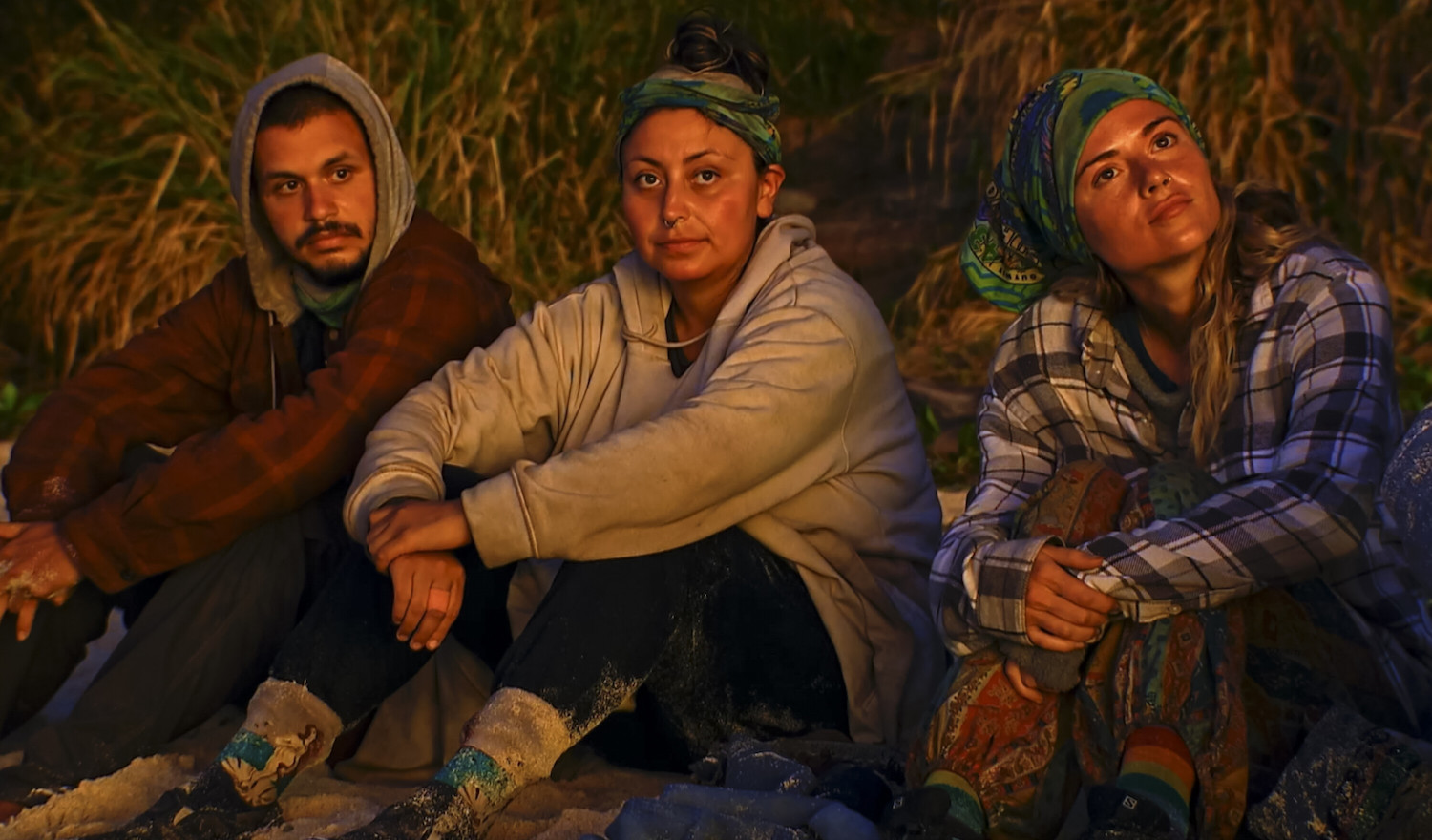 Jesse Lopez, Karla Cruz Godoy, and Cassidy Clark watching the sunrise in 'Survivor' Season 43