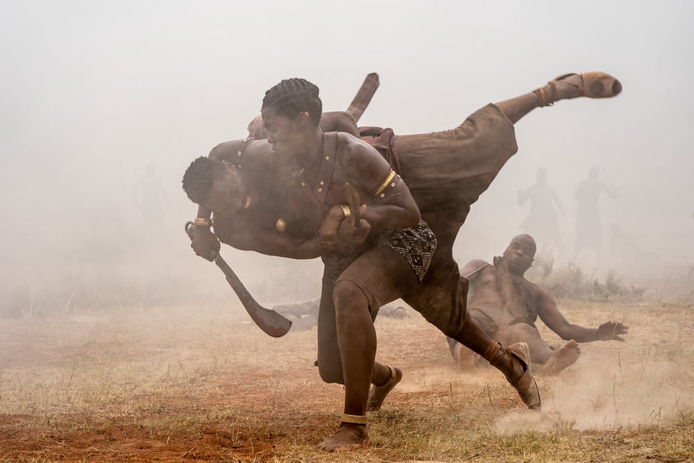 'The Woman King': Izogie (Lashana Lynch) takes down enemy men