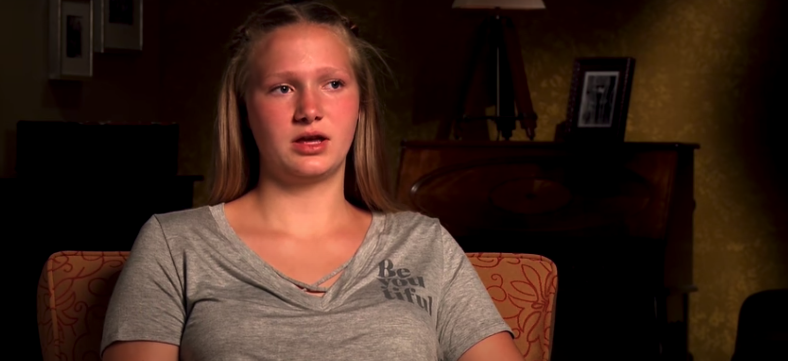 Ysabel Brown, daughter of Kody Brown, wearing a grey t-shirt in an episode of TLC's 'Sister Wives'