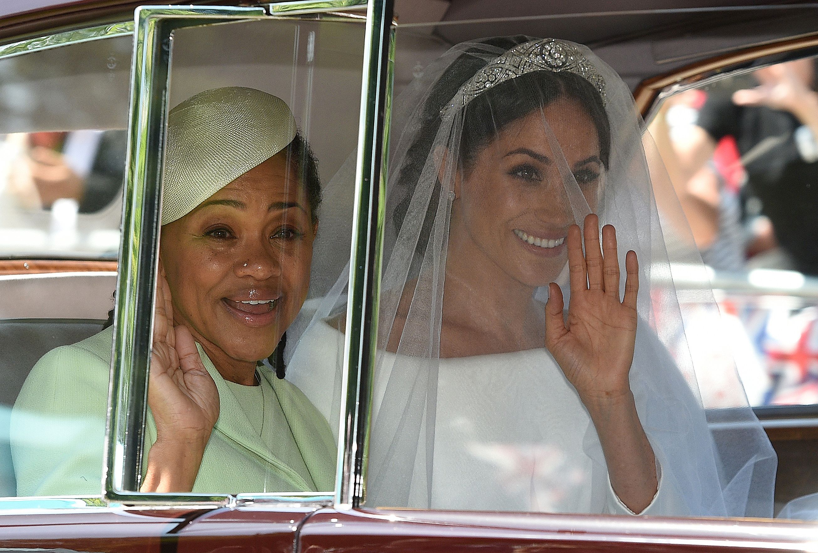 Doria Ragland sits next to Meghan Markle on her wedding day.