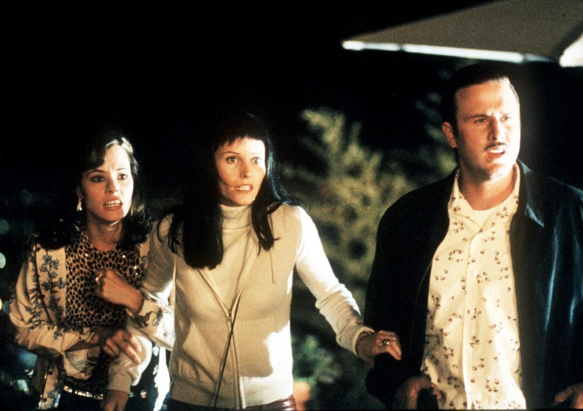 Parker Posey, Courteney Cox Arquette, and David Arquette look stunned in 'Scream 3' 