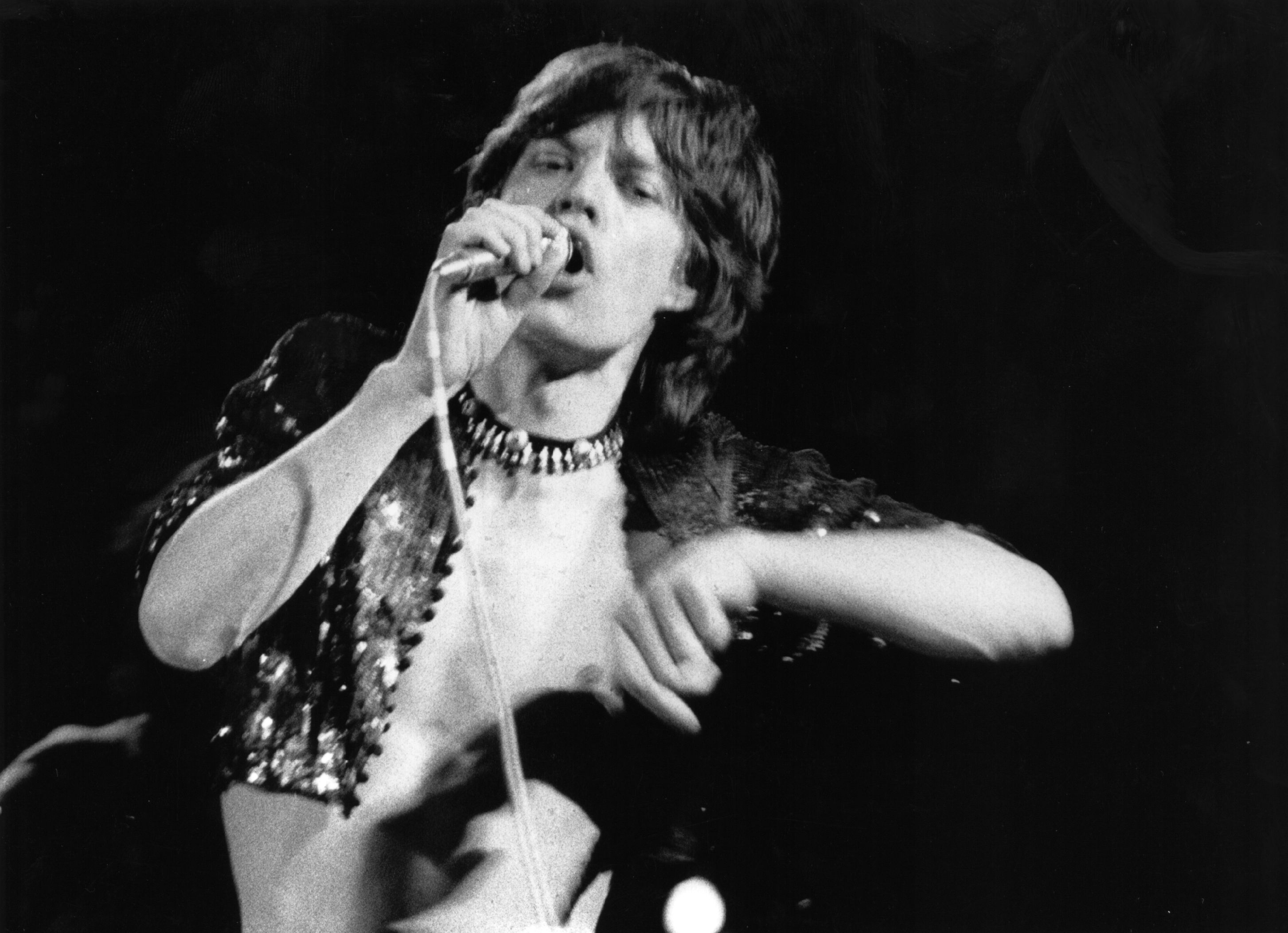 The Rolling Stones’ Mick Jagger with a microphone