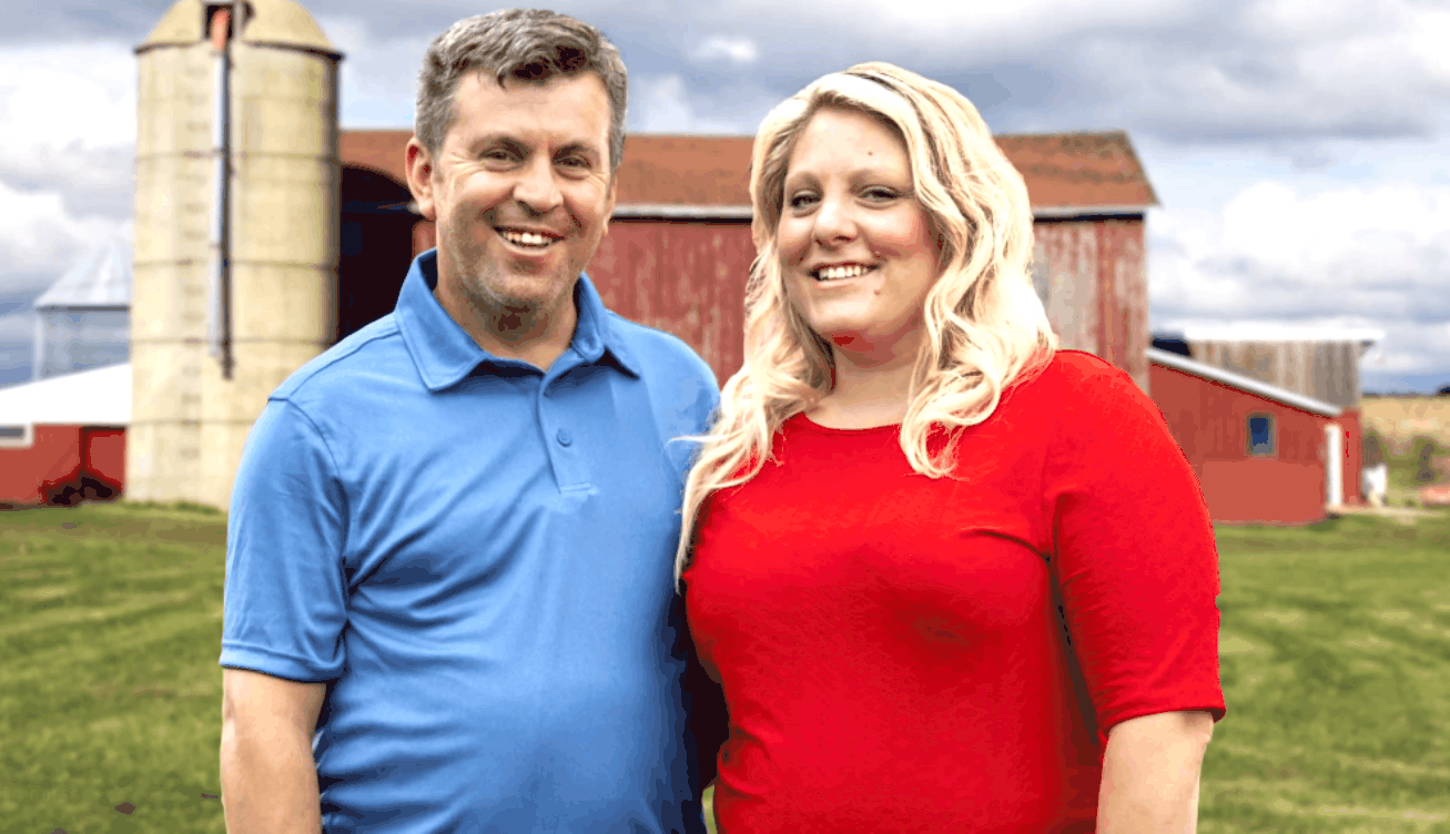 Anna-Marie Campisi and Mursel Mistanoglu standing in front of a farm in Virginia on ’90 Day Fiancé’ on TLC.