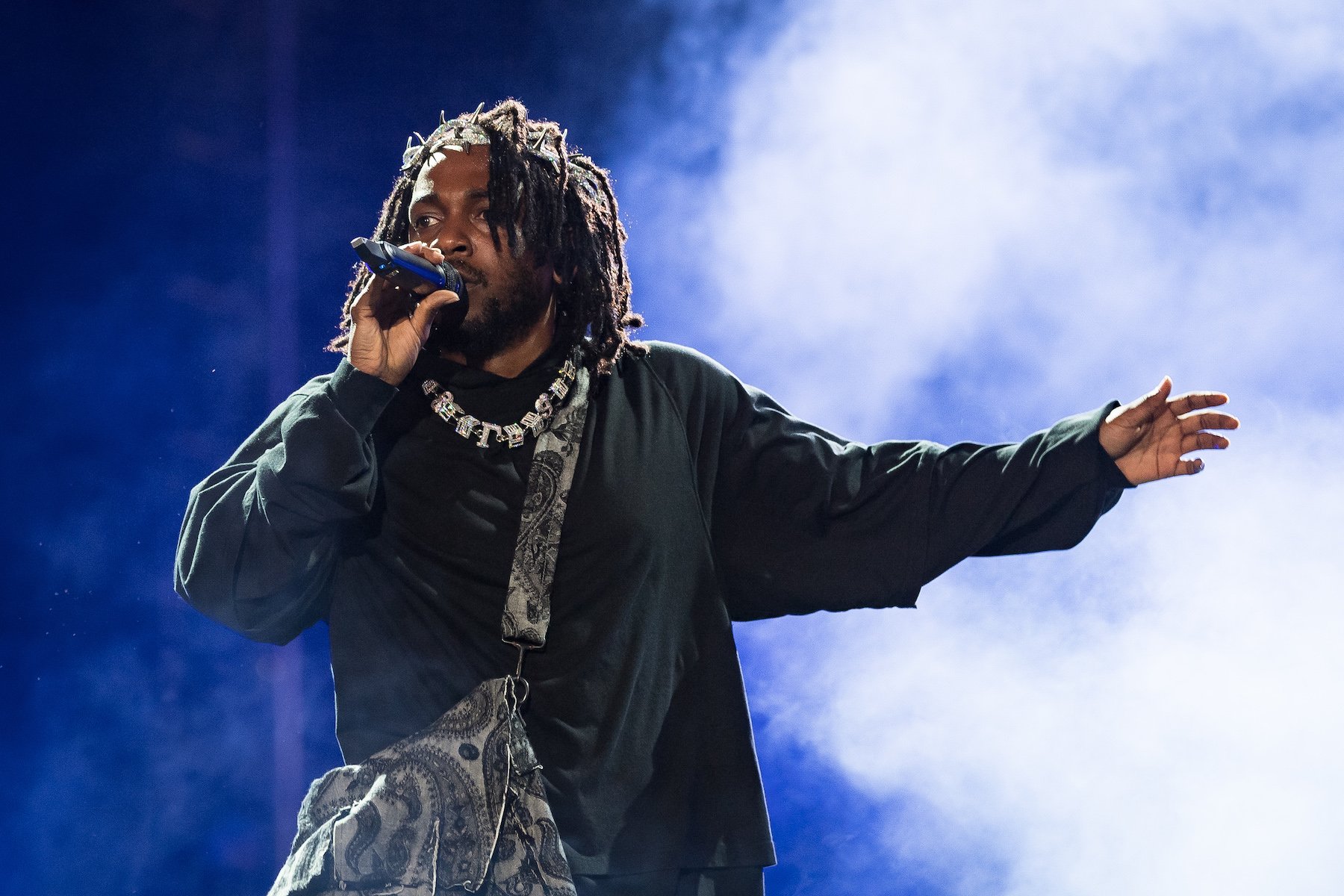 Kendrick Lamar, one of the performers at Bonnaroo 2023, performing wearing black