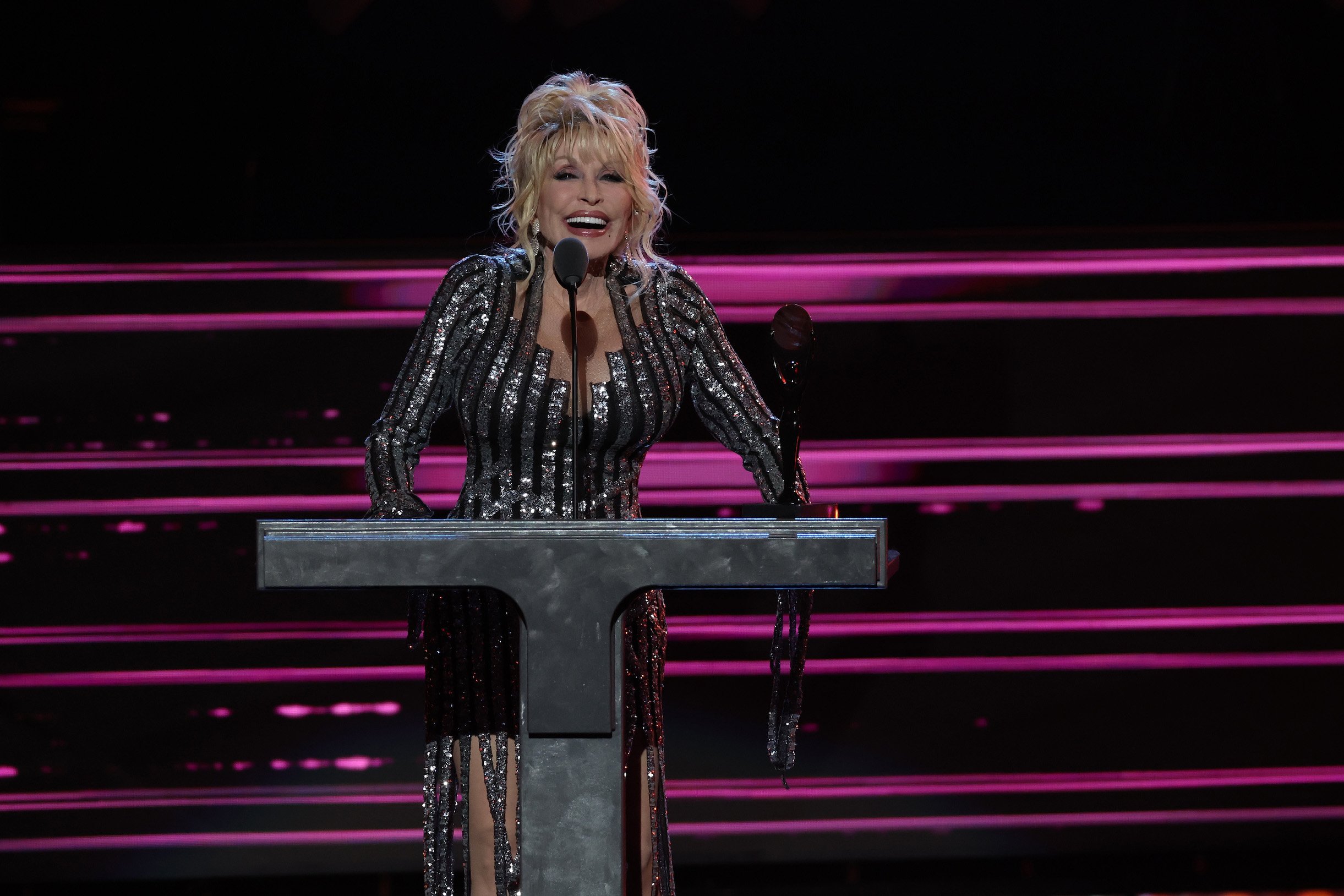 Dolly Parton Threatens to Kick Mick Jagger's 'Bony A**' If He Doesn't ...