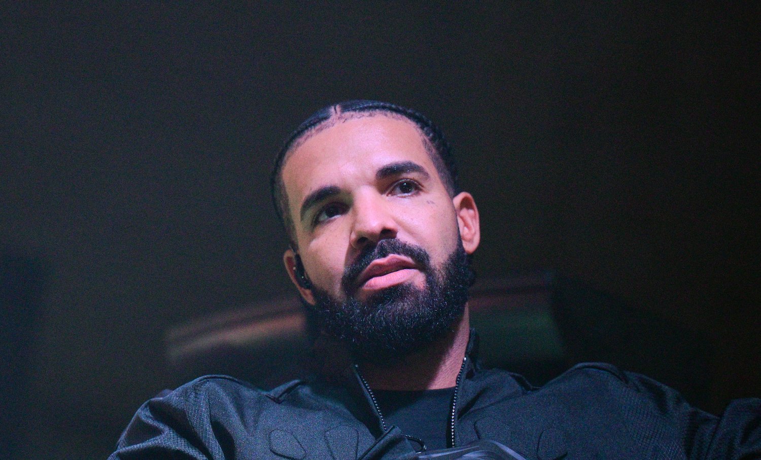 Drake, who thanked rapper Fabolous for helping him get to where he is today, posing for a photo wearing black