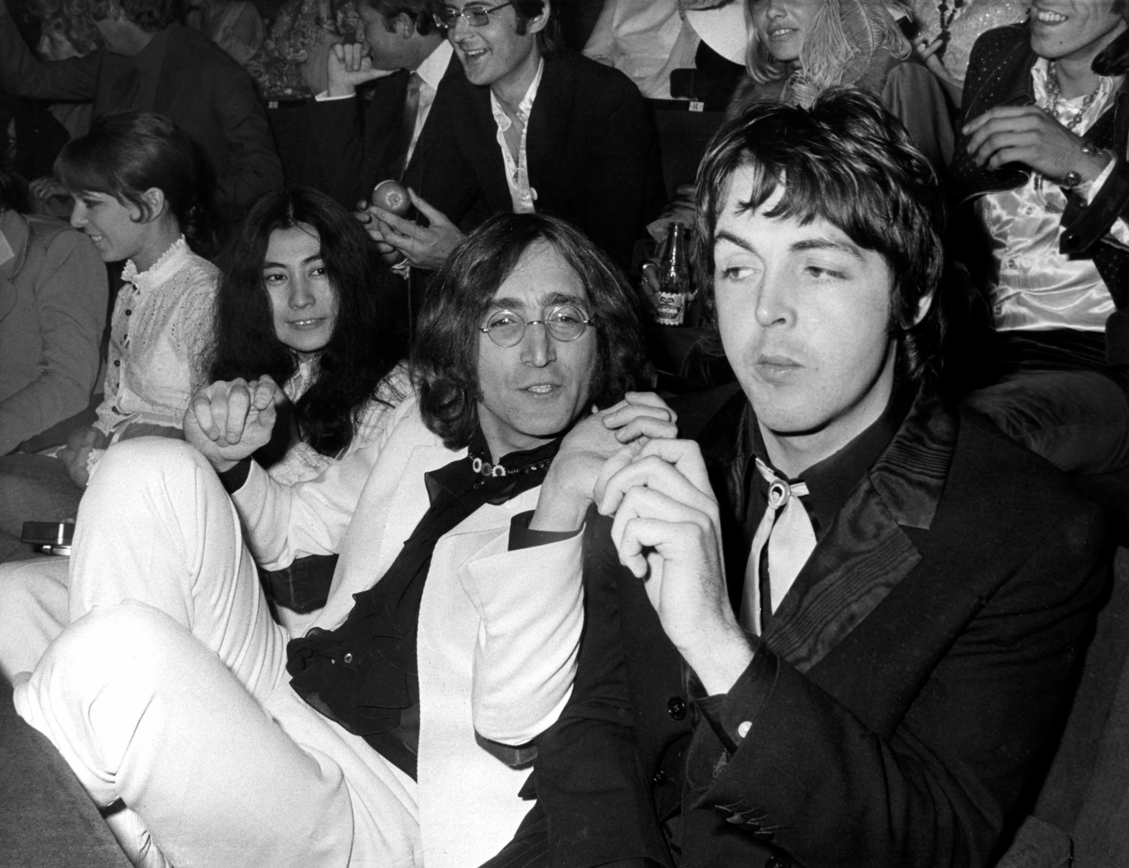 Yoko Ono, John Lennon, and Paul McCartney attend the premiere of Yellow Submarine