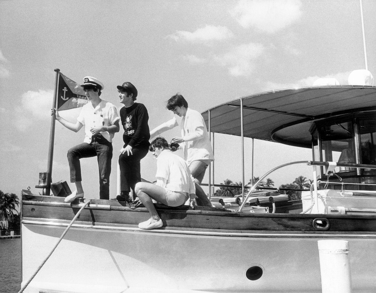 Paul McCartney with The Beatles on a yacht in Miami in 1964.