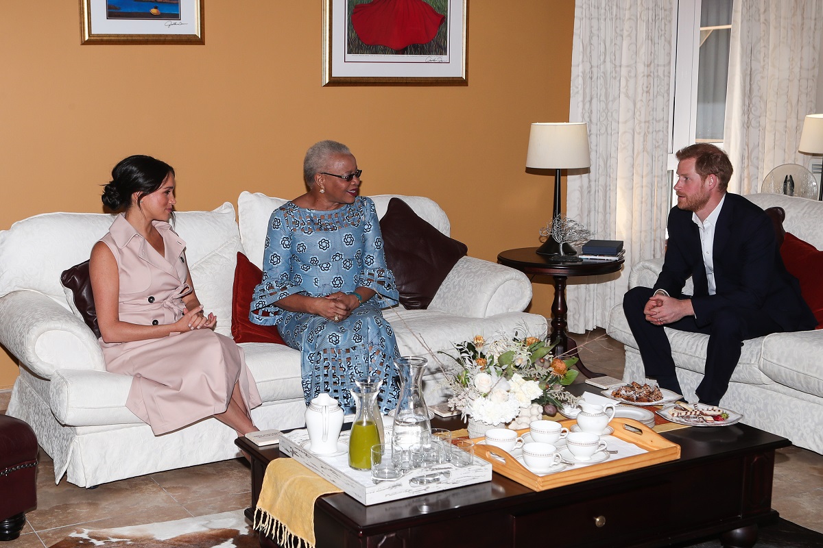 Prince Harry and Meghan Markle meeting with Graca Machel, widow of Nelson Mandela in Johannesburg, South Africa