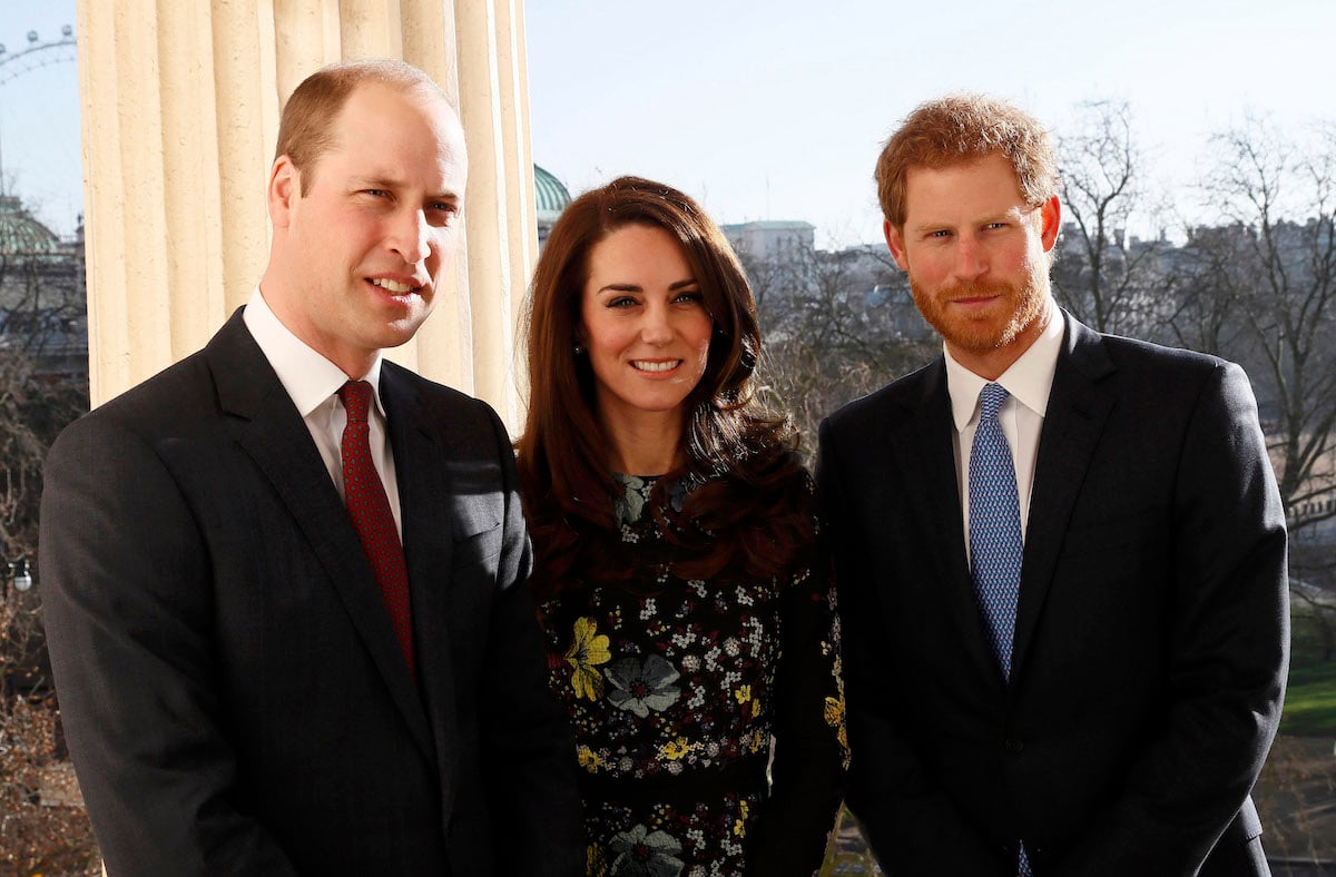 Prince William, Kate Middleton, and Prince Harry, who used to be Prince William's 'support act', stand together in 2017