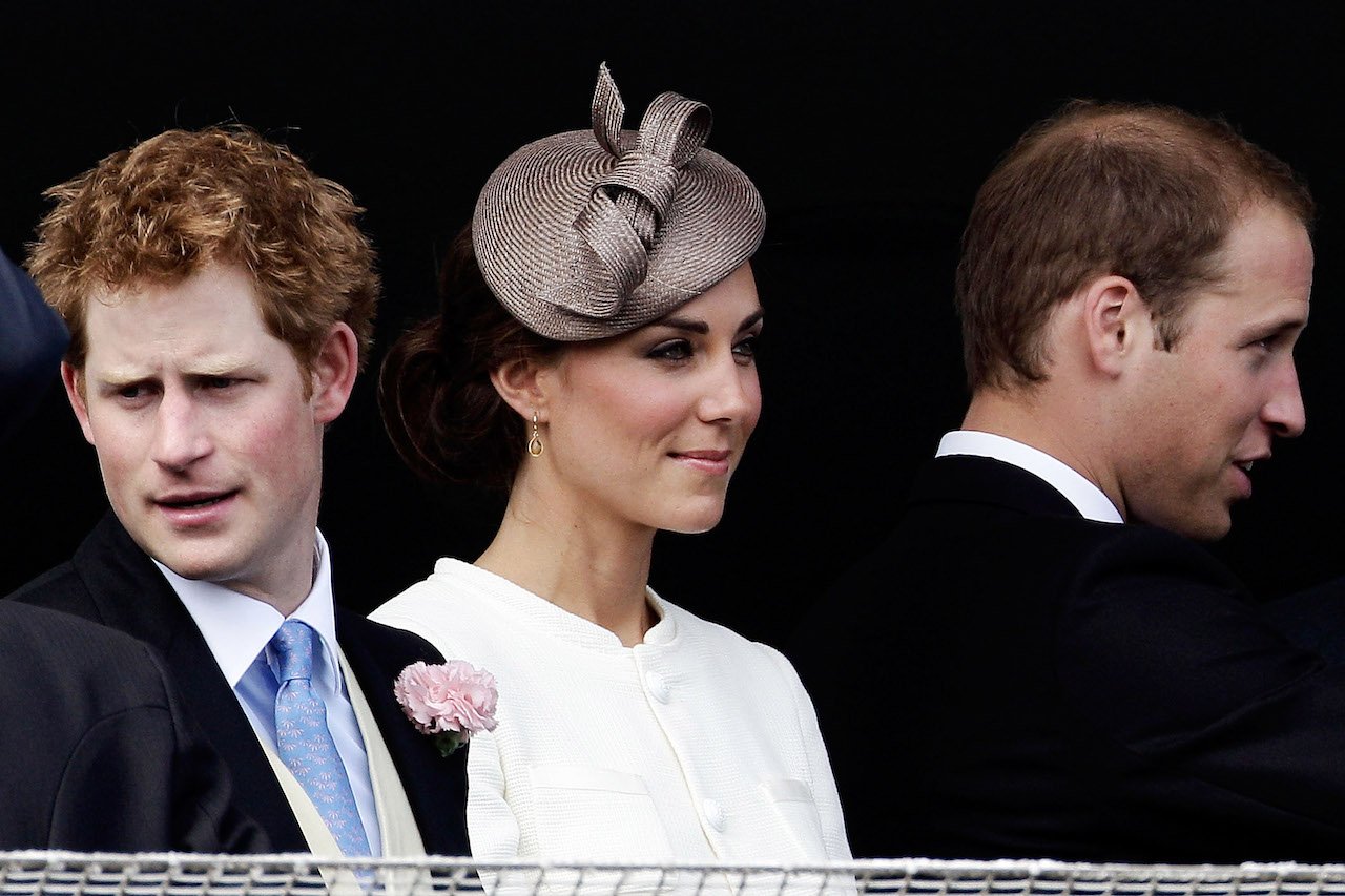 (L-R) Prince Harry, Duke of Sussex, Kate Middleton, Princess of Wales, and Prince William, Prince of Wales in 2011, after William and Kate's engagement.