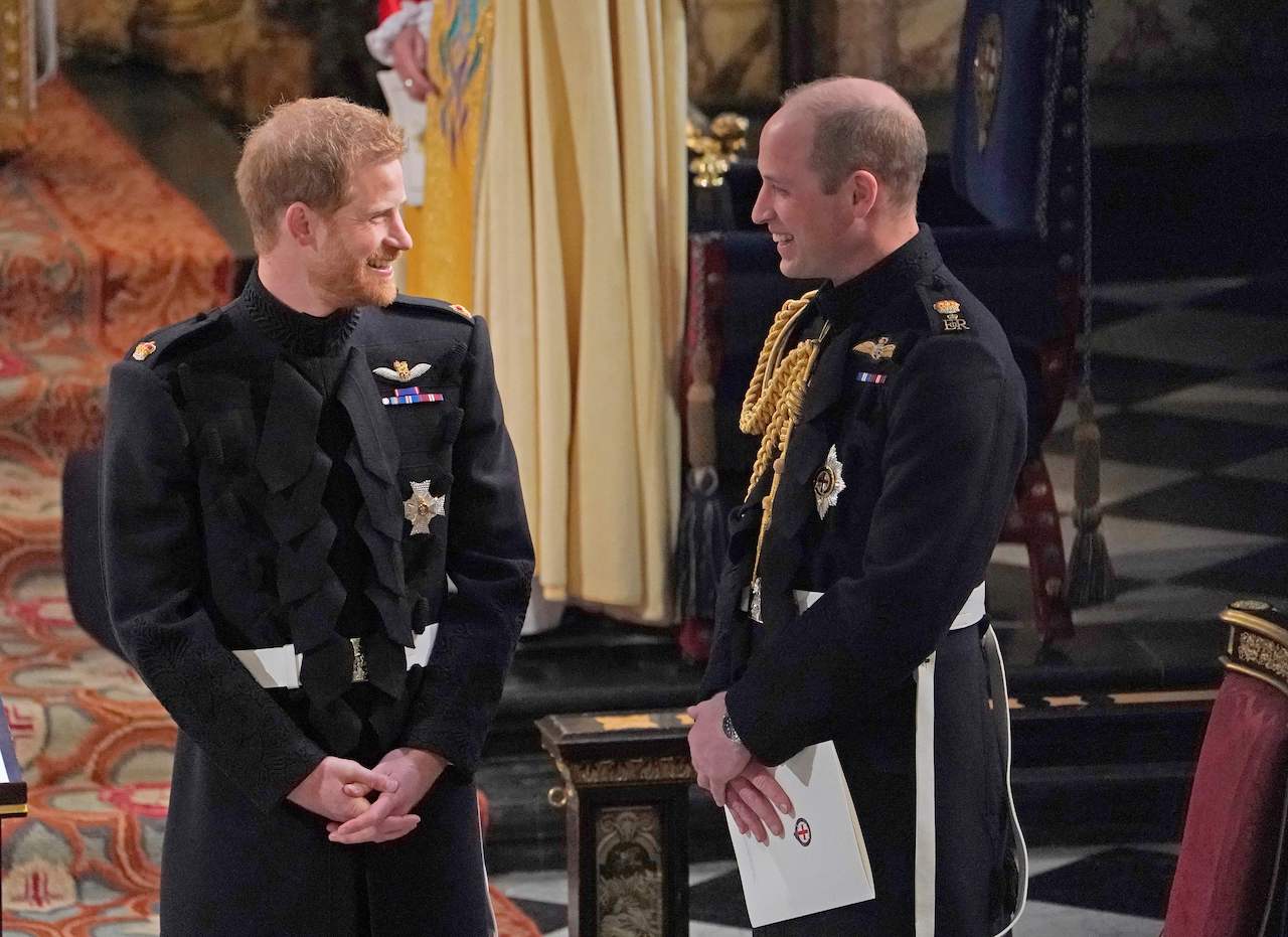 Prince Harry, Duke of Sussex (L) and Prince Harry's brother and best man Prince William, Duke of Cambridge wait in the chapel ahead of his wedding to US actress Meghan Markle at St George's Chapel, Windsor Castle, in Windsor, on May 19, 2018. 