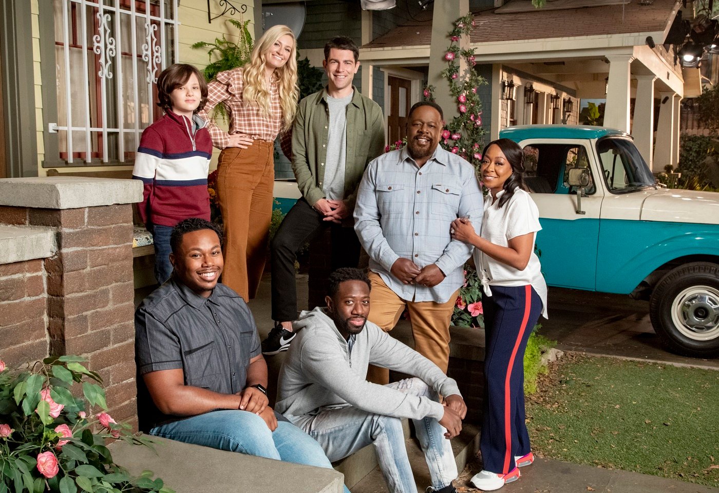 Marcel Spears, Hank Greenspan, Beth Behrs, Max Greenfield, Seaun McKinney, Cedric the Entertainer and Tichina Arnold pose for promotional photos for 'The Neighborhood'