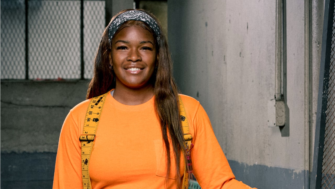 Synethia Bland posing for 'Tough as Nails' cast photo