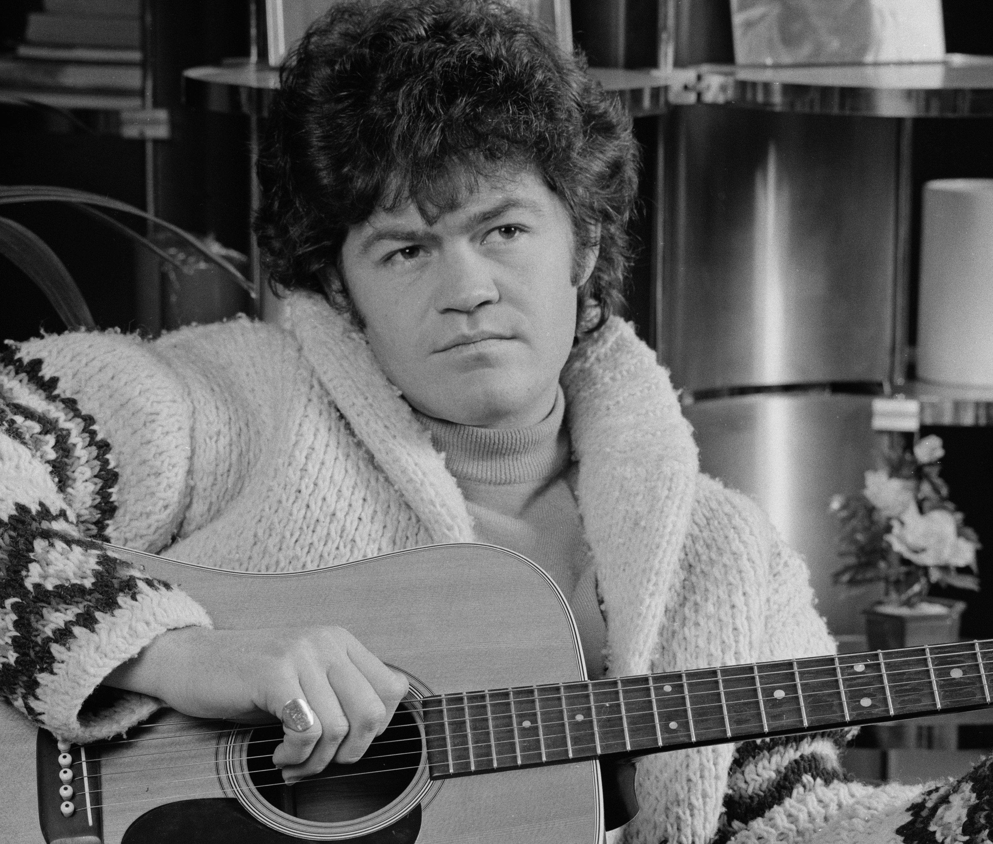 The Monkees' Micky Dolenz with a guitar