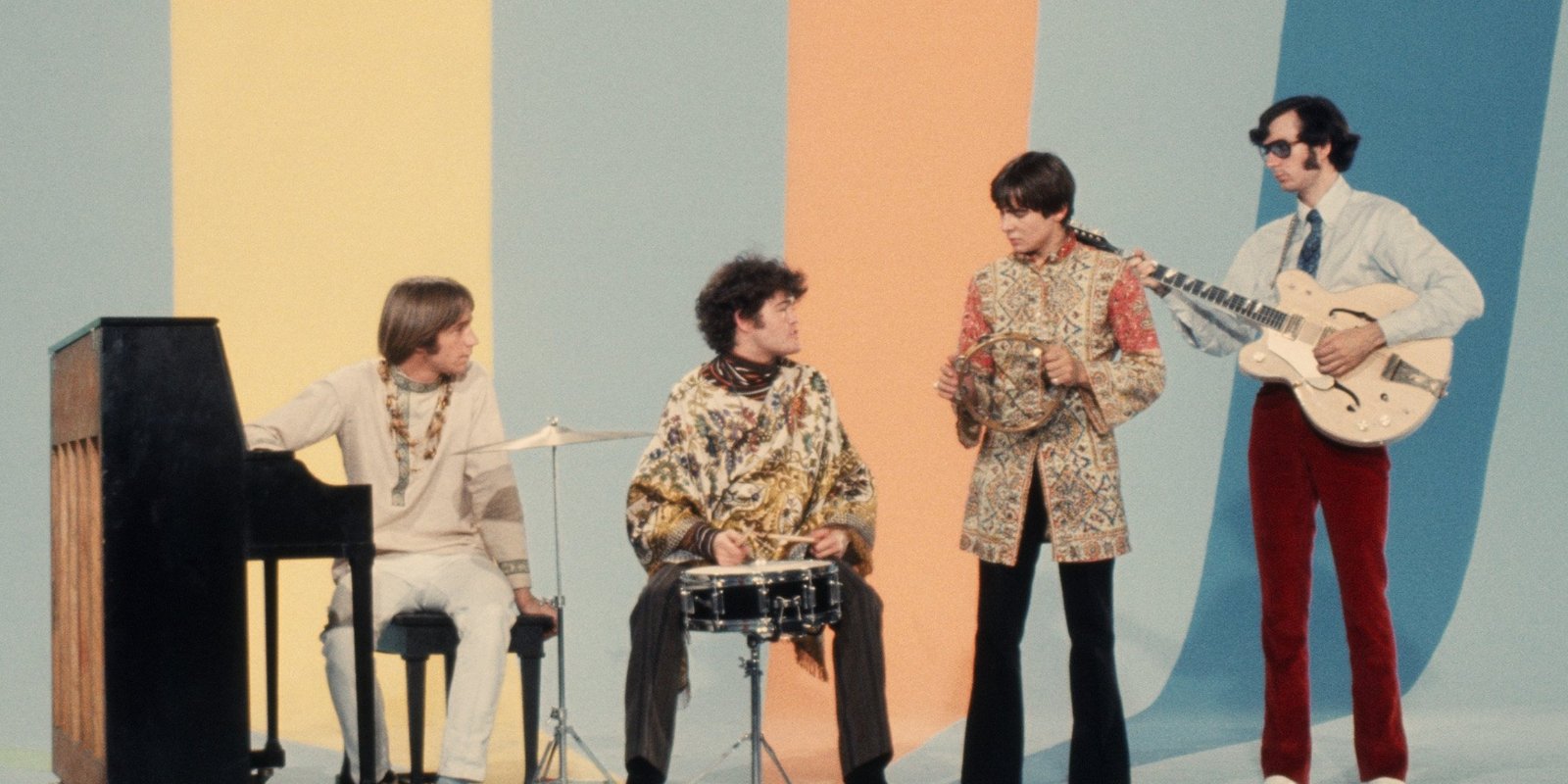 Peter Tork, Micky Dolenz, Davy Jones, and Mike Nesmith on the set of The Monkees.