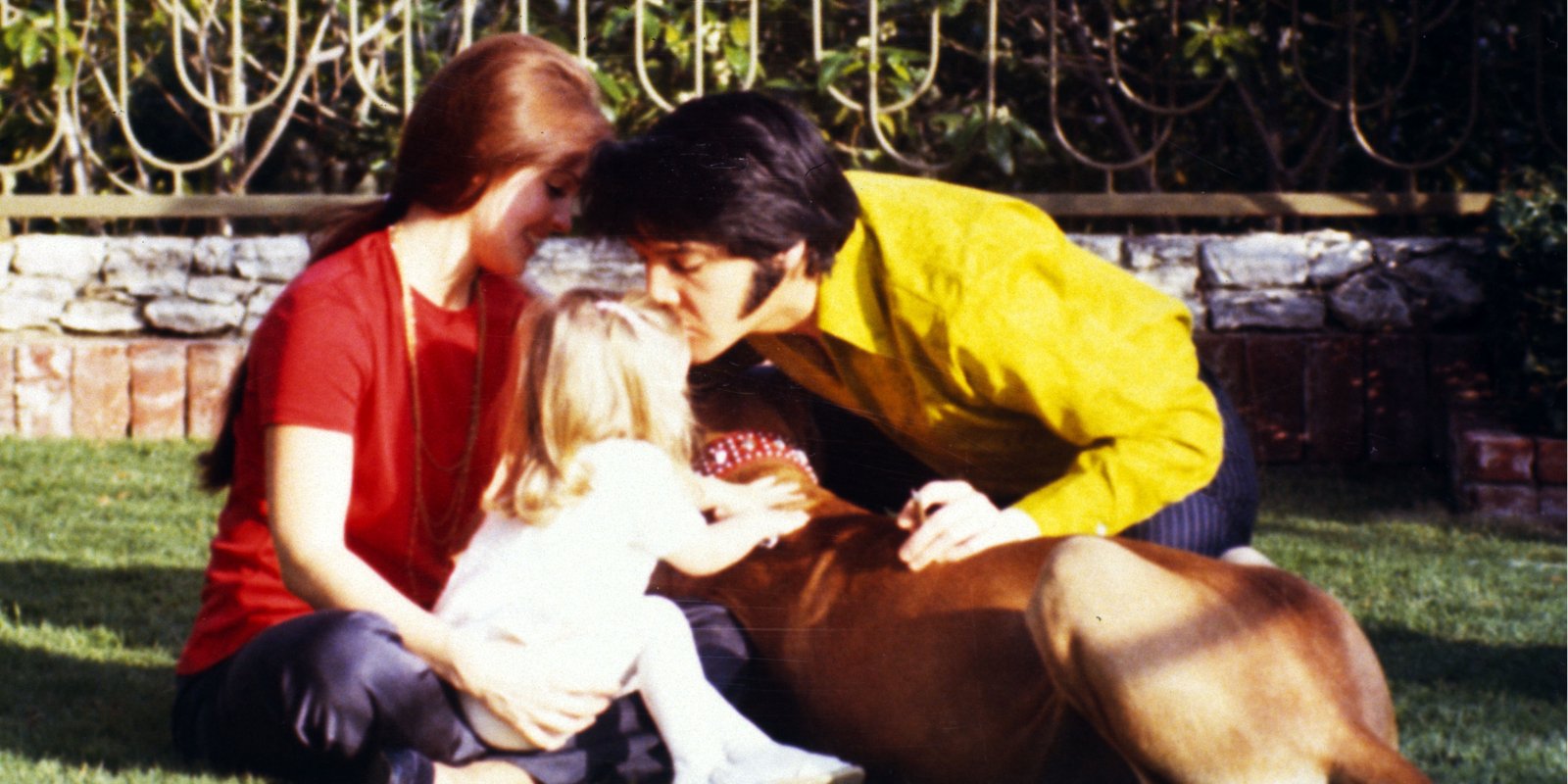 Priscilla, Elvis, and Lisa Marie Presley photographed in the early 1970s.