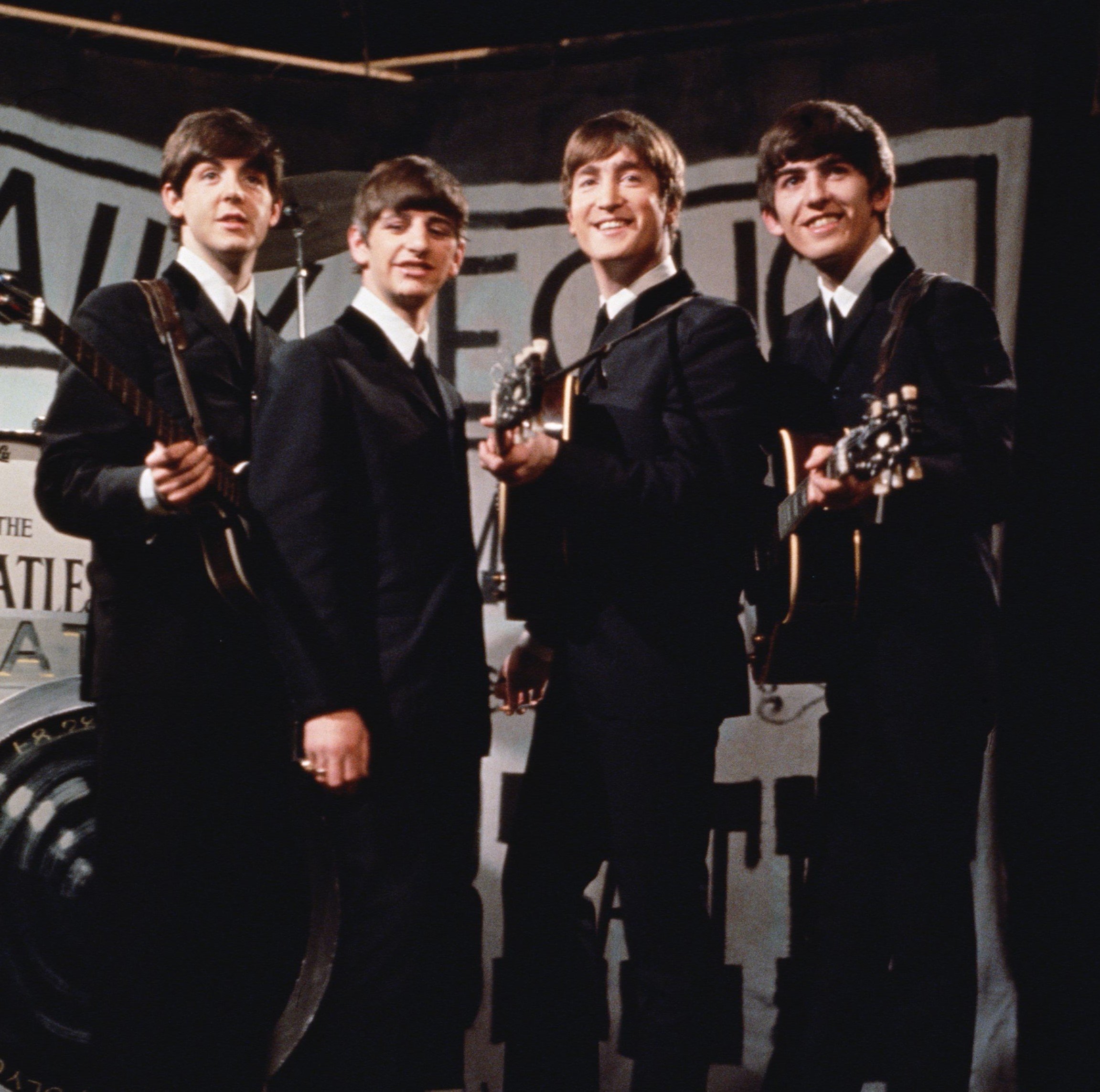 The Beatles in suits