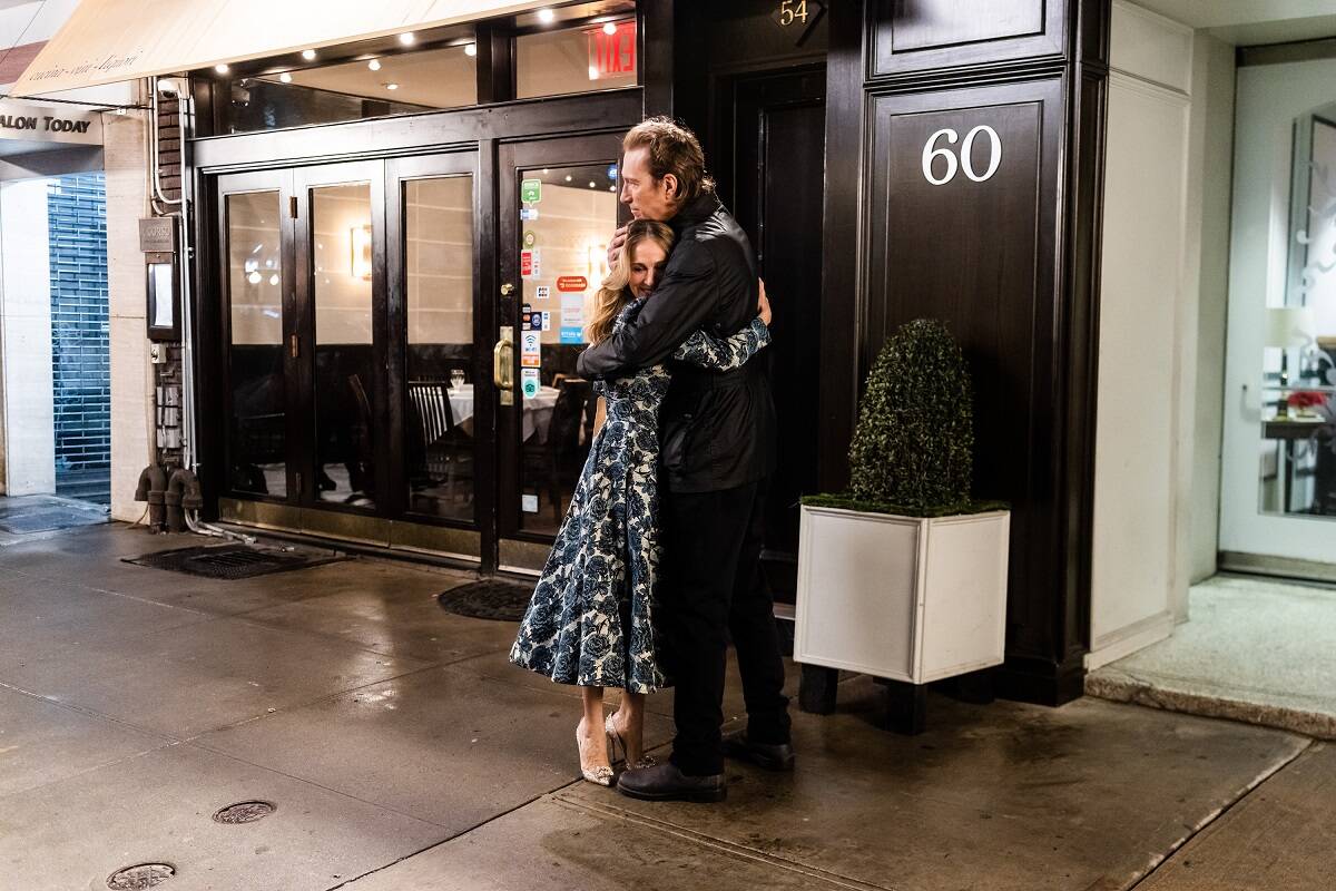 Carrie Bradshaw and Aidan Shaw embrace in an episode of 'And Just Like That...' season 2