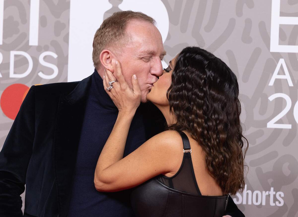 Francois-Henri Pinault and Salma Hayek Pinault kiss at The BRIT Awards 2023