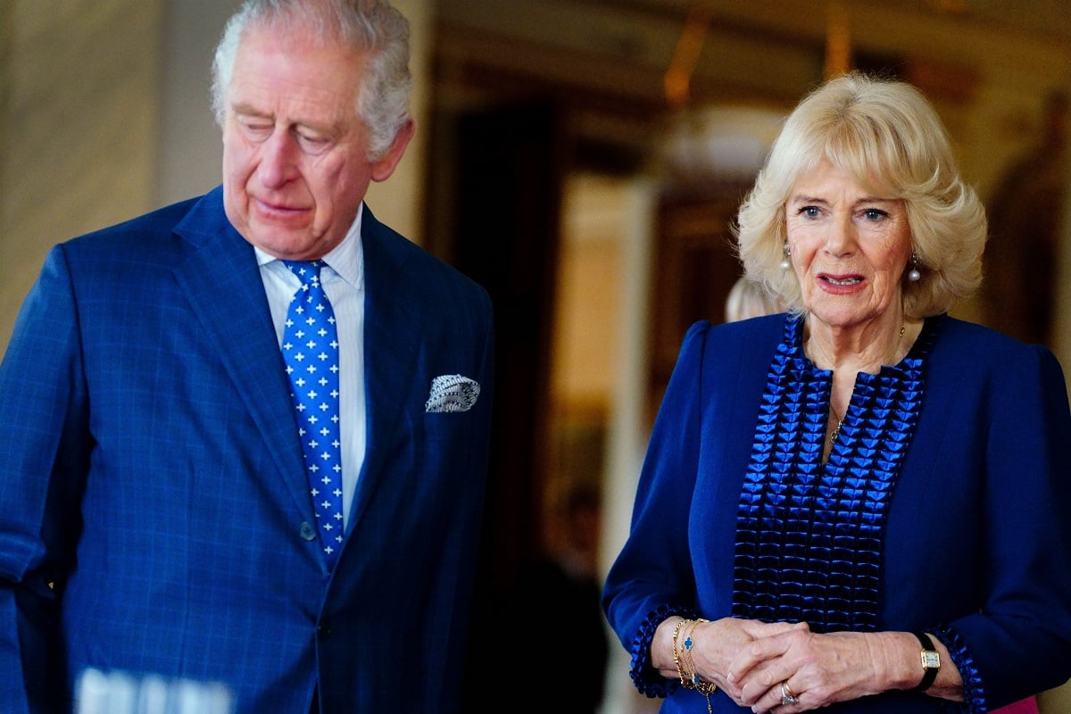 King Charles III and Camilla Parker Bowles talk with genocide survivors after lighting candles to mark Holocaust Memorial Day