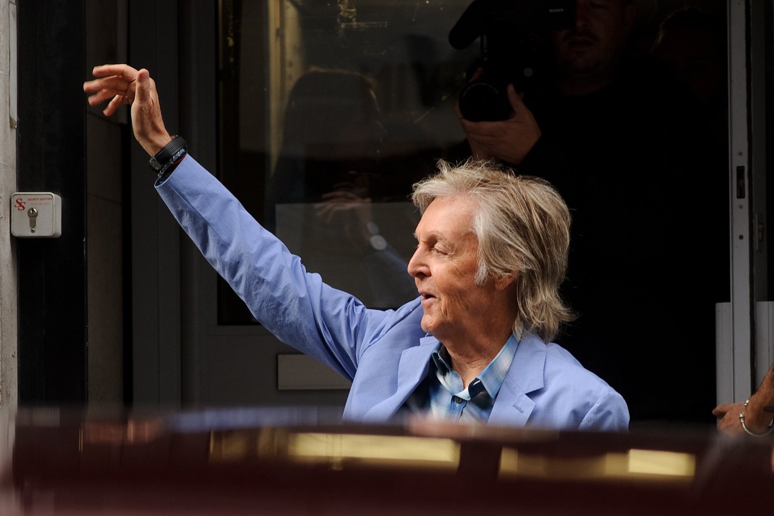 Paul McCartney is seen leaving Waterstones Bookstore in London, England