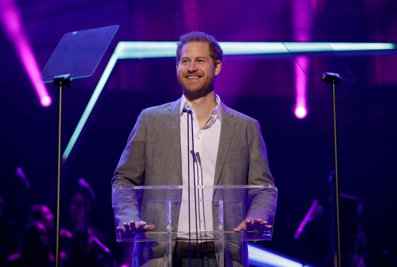 Prince Harry gives a speech on stage before announcing the winners of the Health and Wellbeing category at the inaugural OnSide Awards at the Royal Albert Hall in London on Nov. 17, 2019.