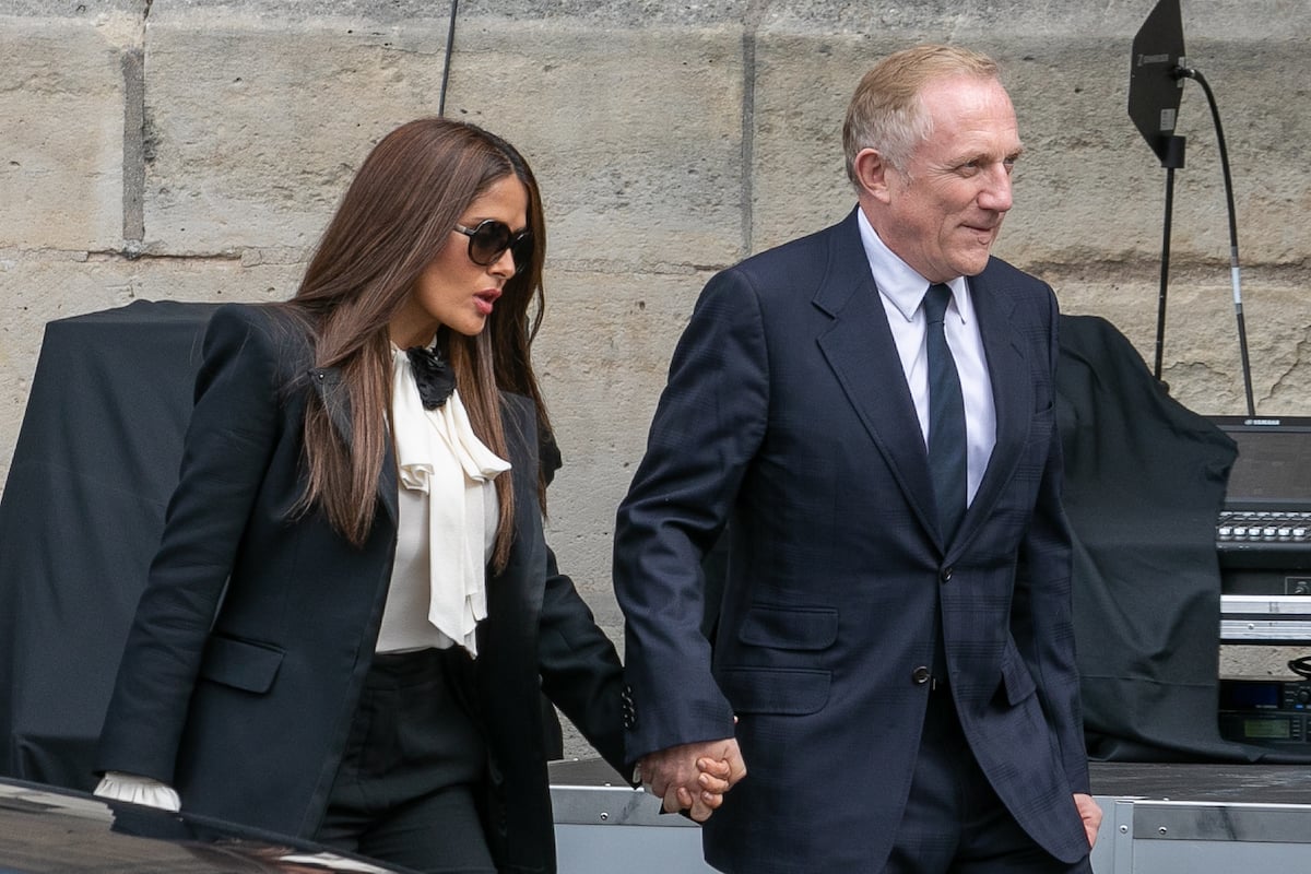 Salma Hayek holds hands with her husband Francois-Henri Pinault