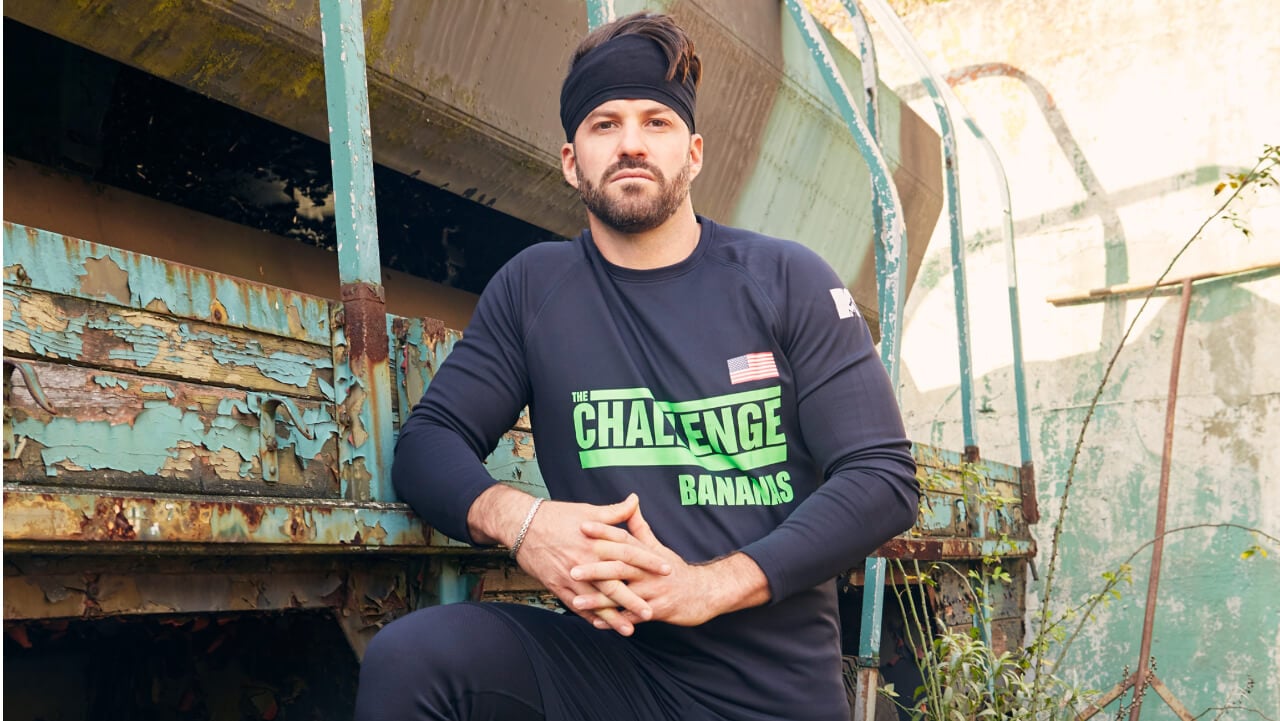 Johnny 'Bananas' Devenanzio posing for 'The Challenge: Total Madness' cast photo