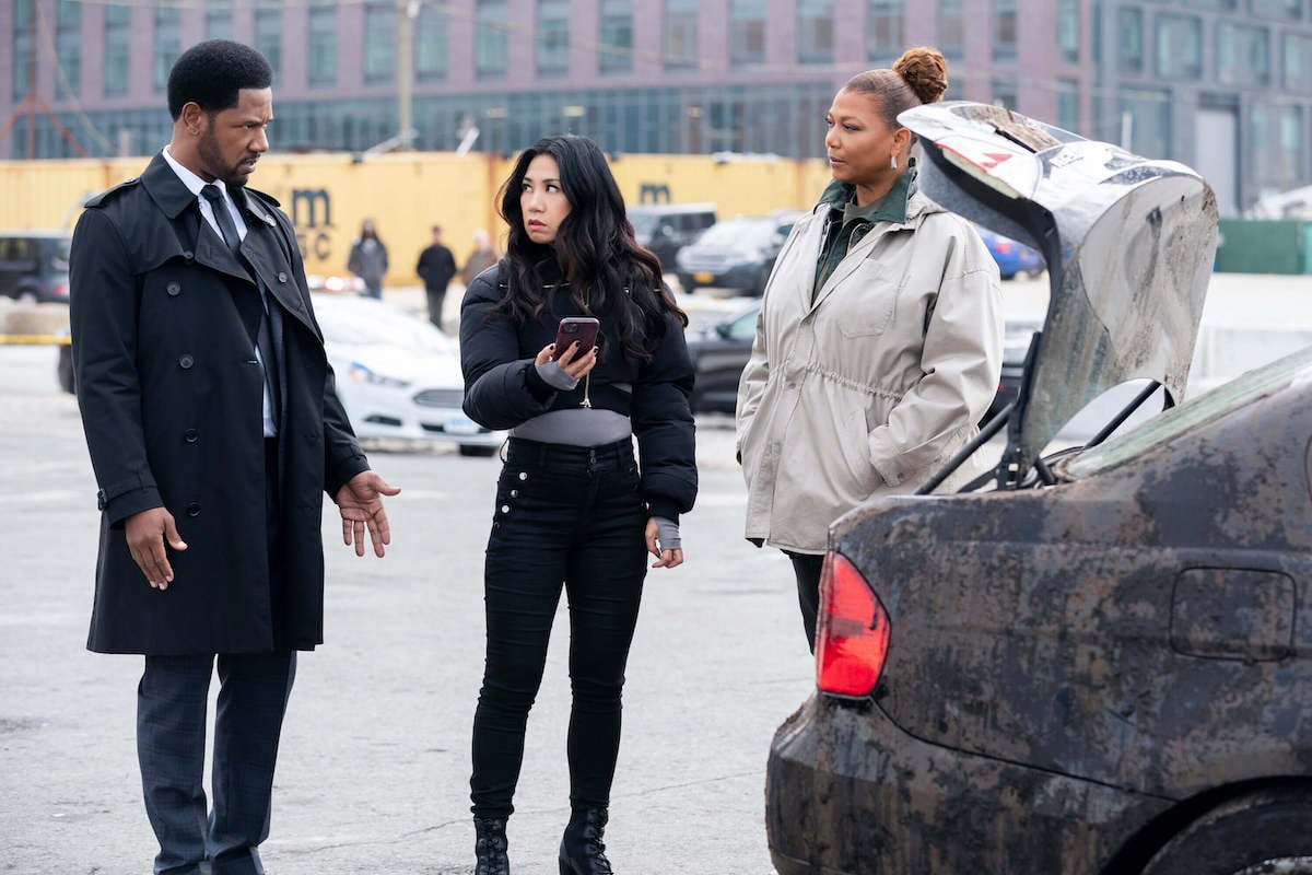 Dante, Mel, and Robyn standing near a car in 'The Equalizer' Season 3 Episode 8